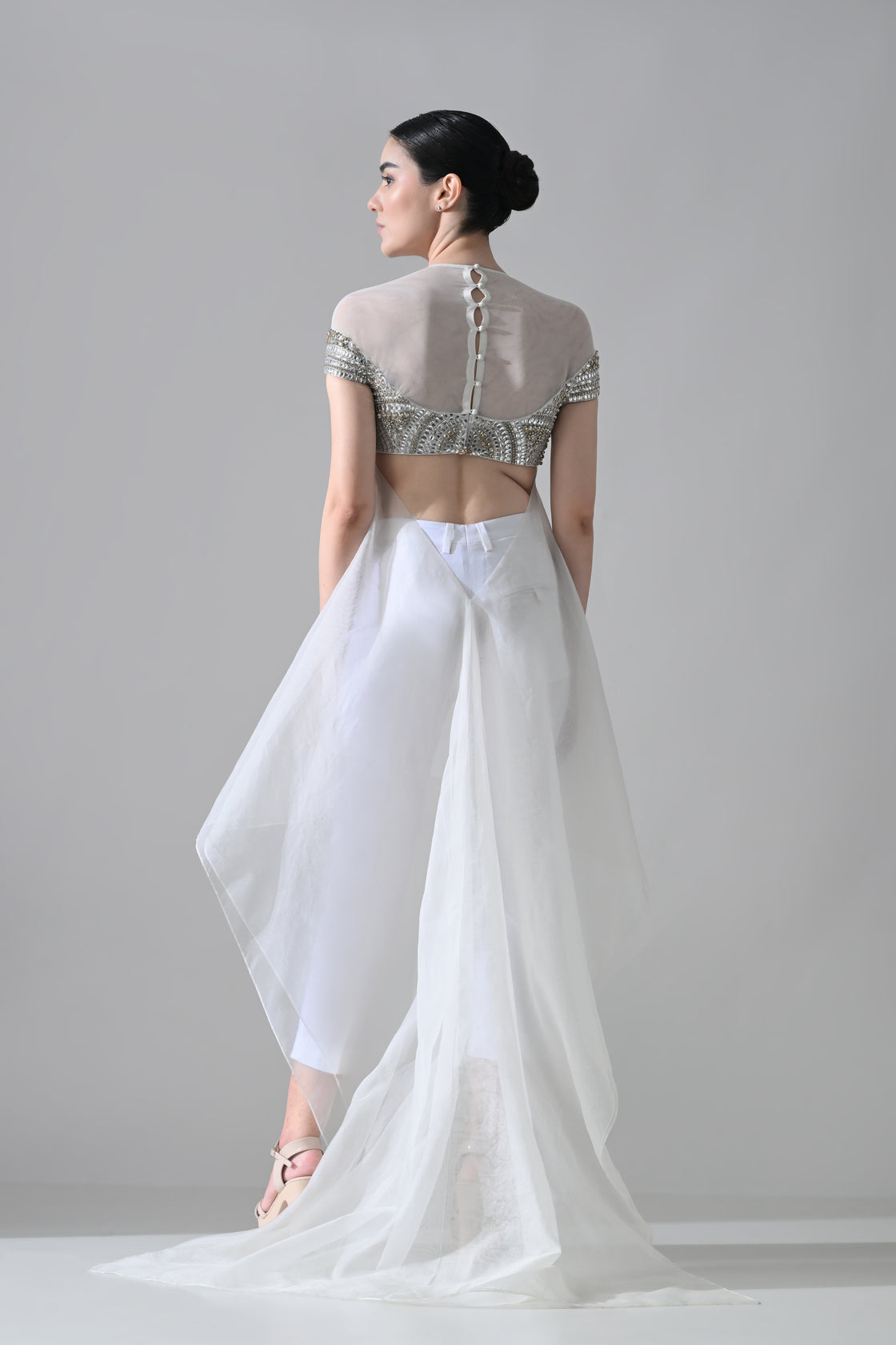 Off-White Hand-Embroidered Silhouette with Elongated Asymmetric Fall