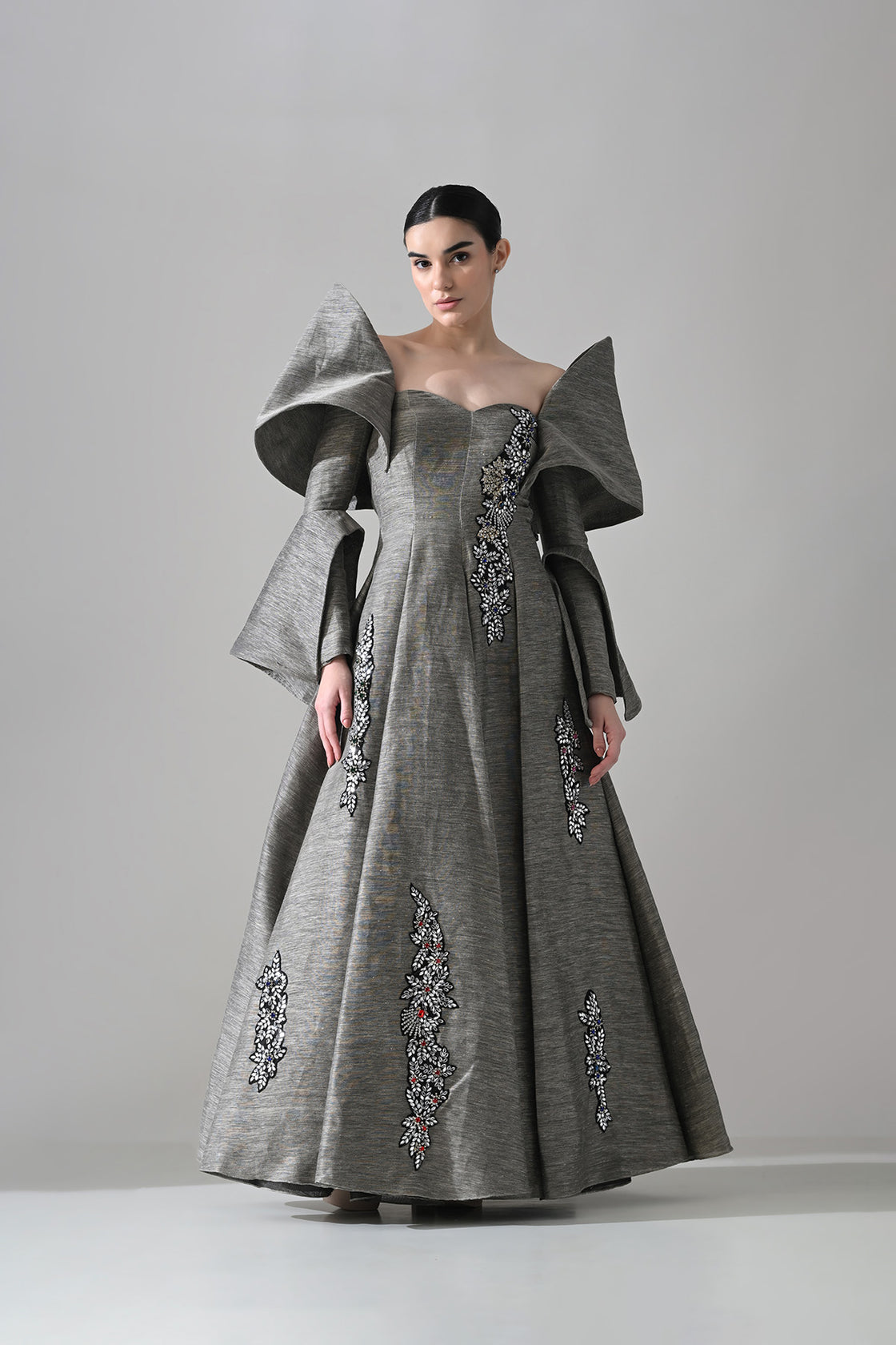 Grey Gown With Embellished Panels And Structured Sleeves Detail