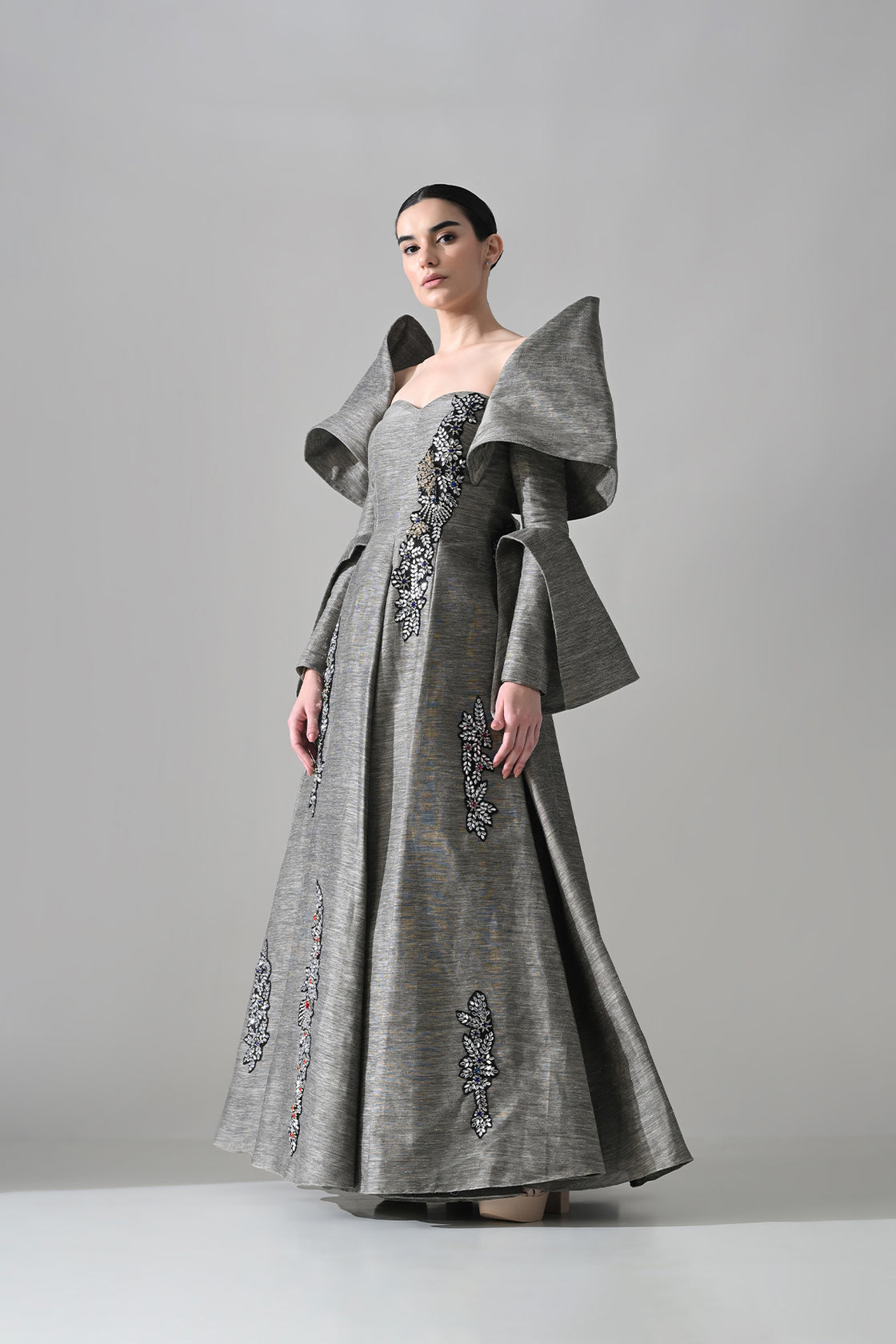 Grey Gown With Embellished Panels And Structured Sleeves Detail