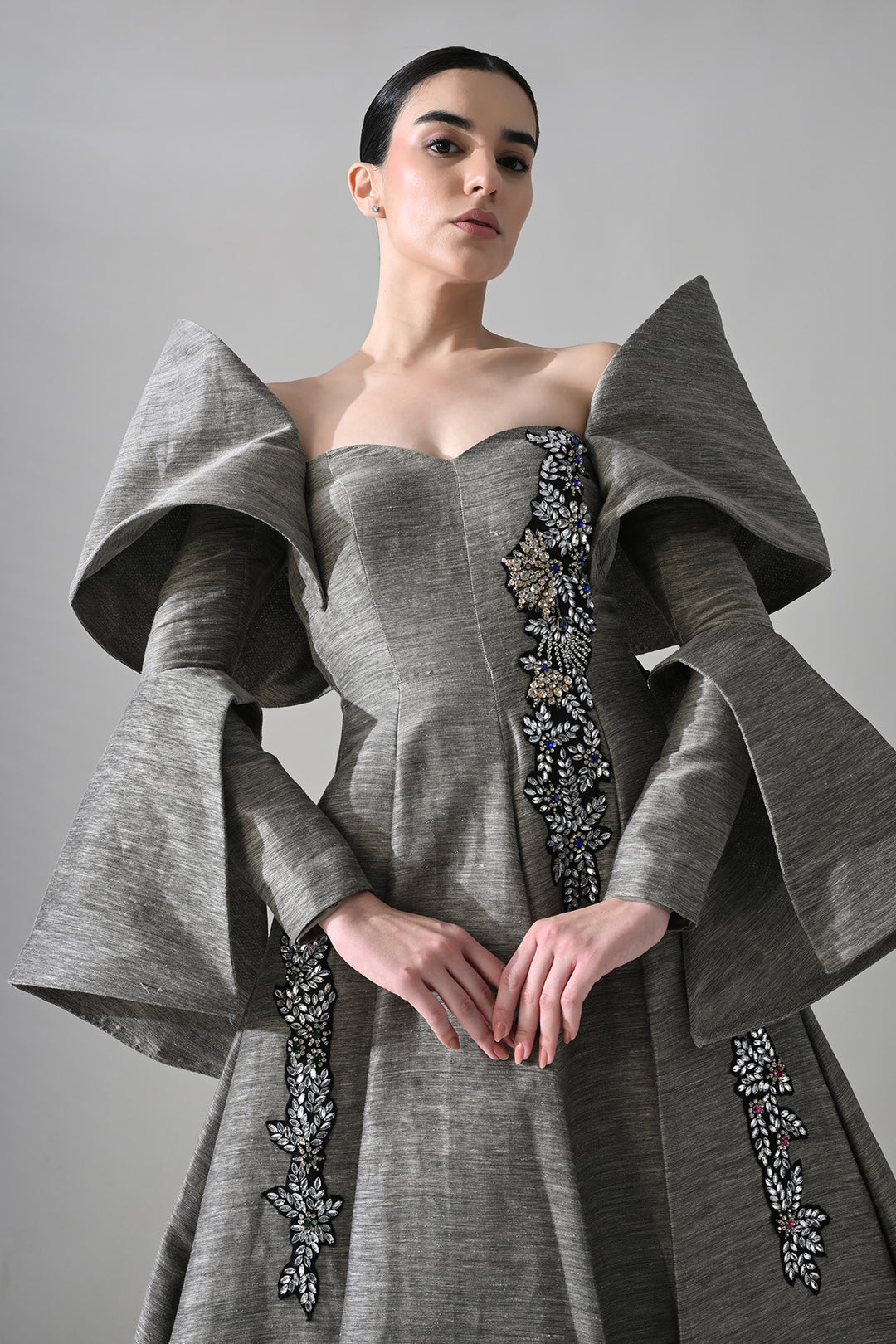 Grey Gown With Embellished Panels And Structured Sleeves Detail