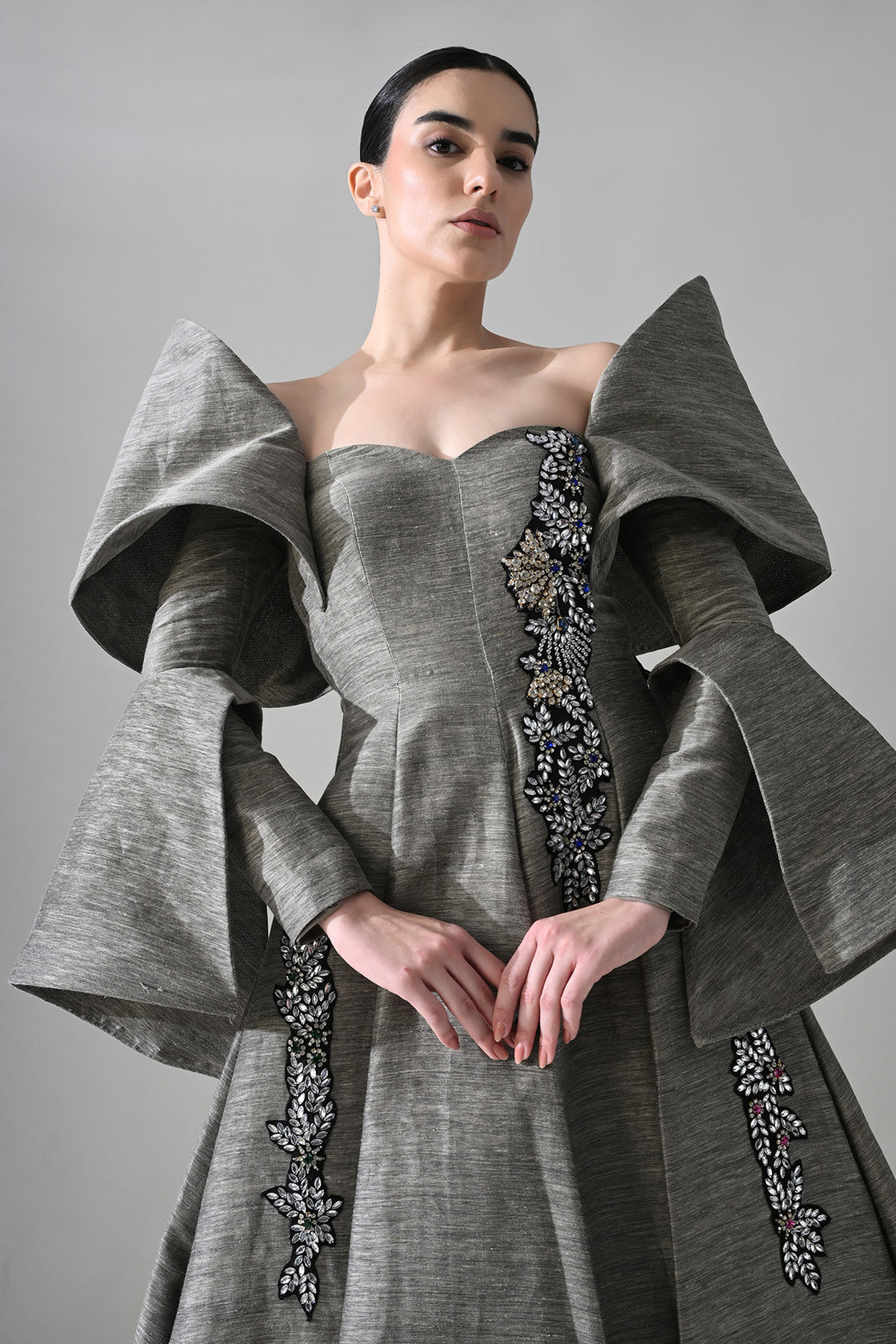 Grey Gown With Embellished Panels And Structured Sleeves Detail
