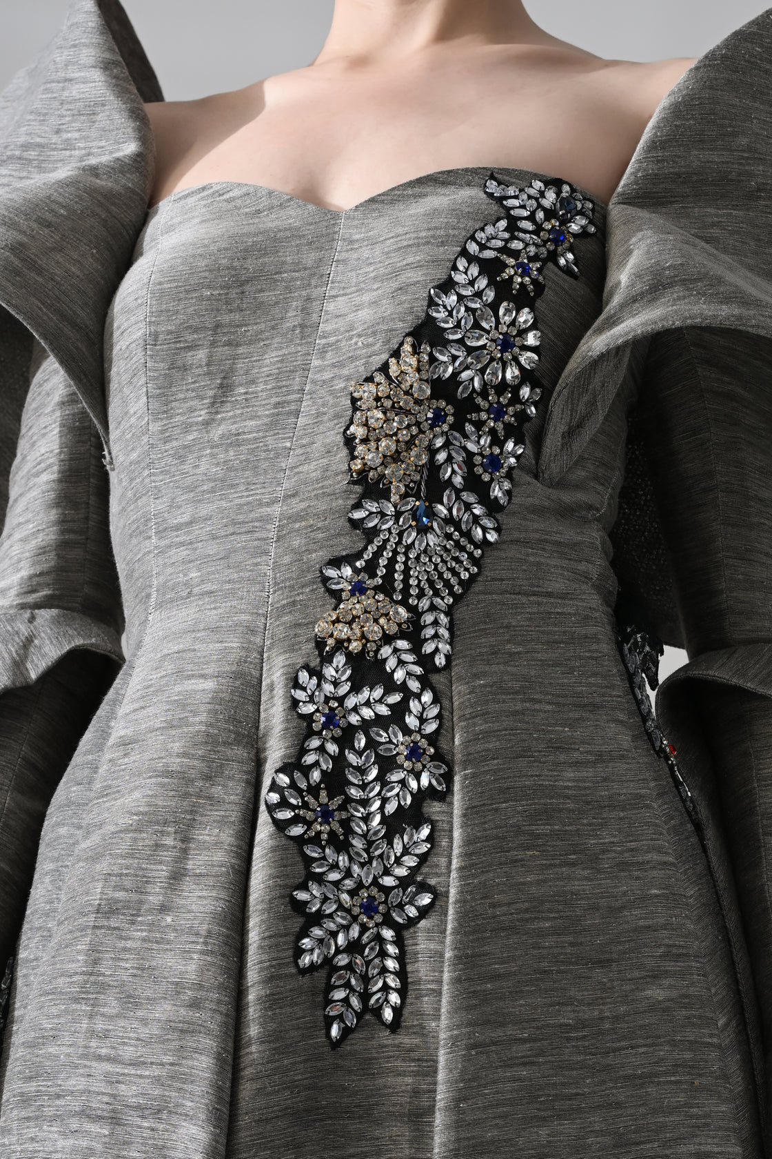 Grey Gown with Embellished Panels and Architectural Sleeves