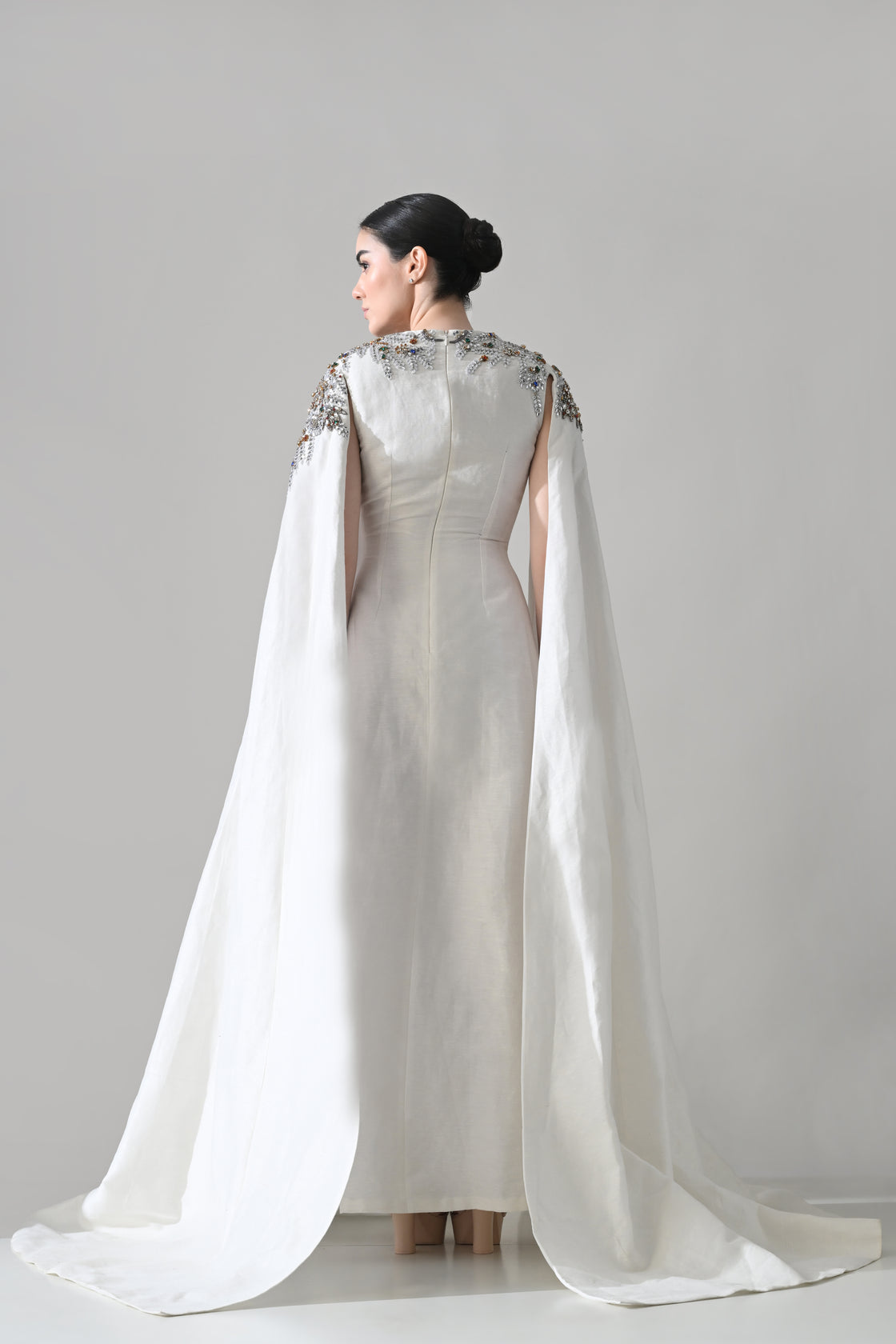 Ivory Gown with Hand-Embellished Shoulders and Draped Cape Sleeves