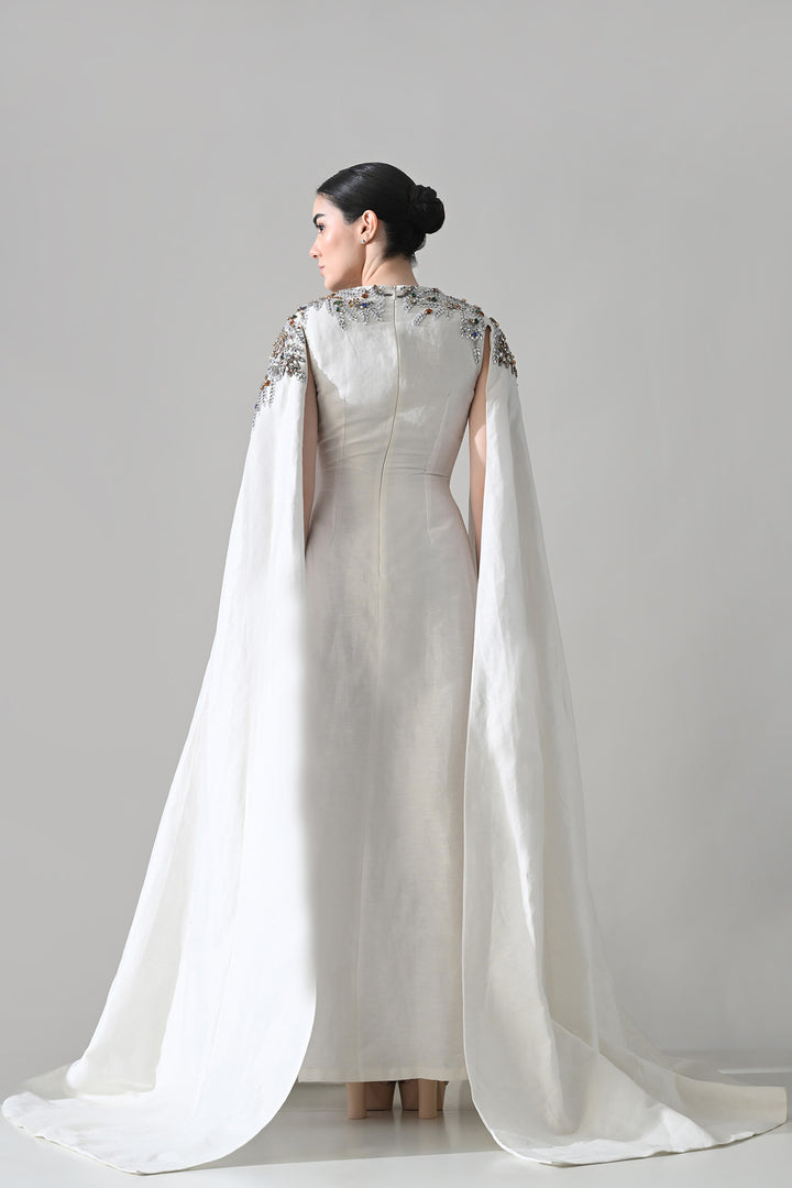 Ivory Gown With Hand-Embellished Shoulders And Draped Cape Sleeves Overlay