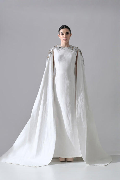 Ivory Gown With Hand-Embellished Shoulders And Draped Cape Sleeves Overlay