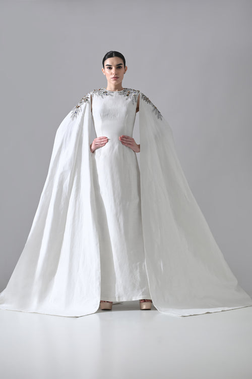 Ivory Gown with Hand-Embellished Shoulders and Draped Cape Sleeves