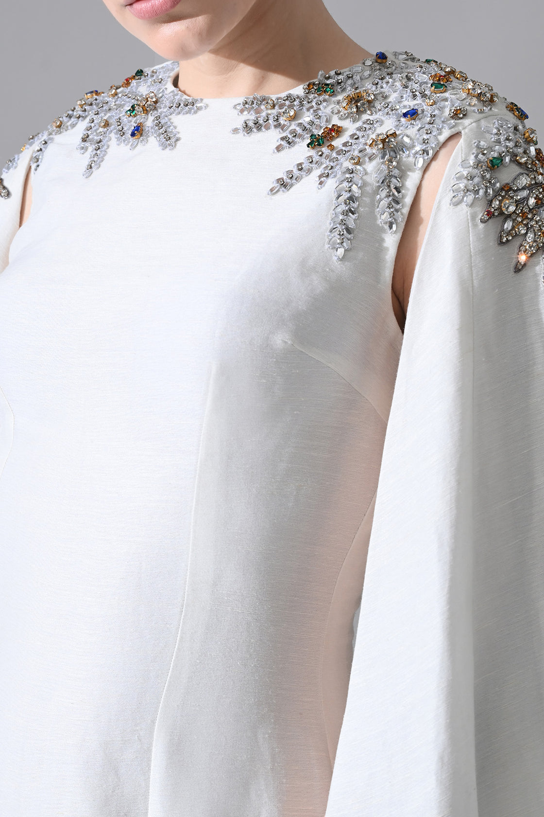Ivory Gown With Hand-Embellished Shoulders And Draped Cape Sleeves Overlay