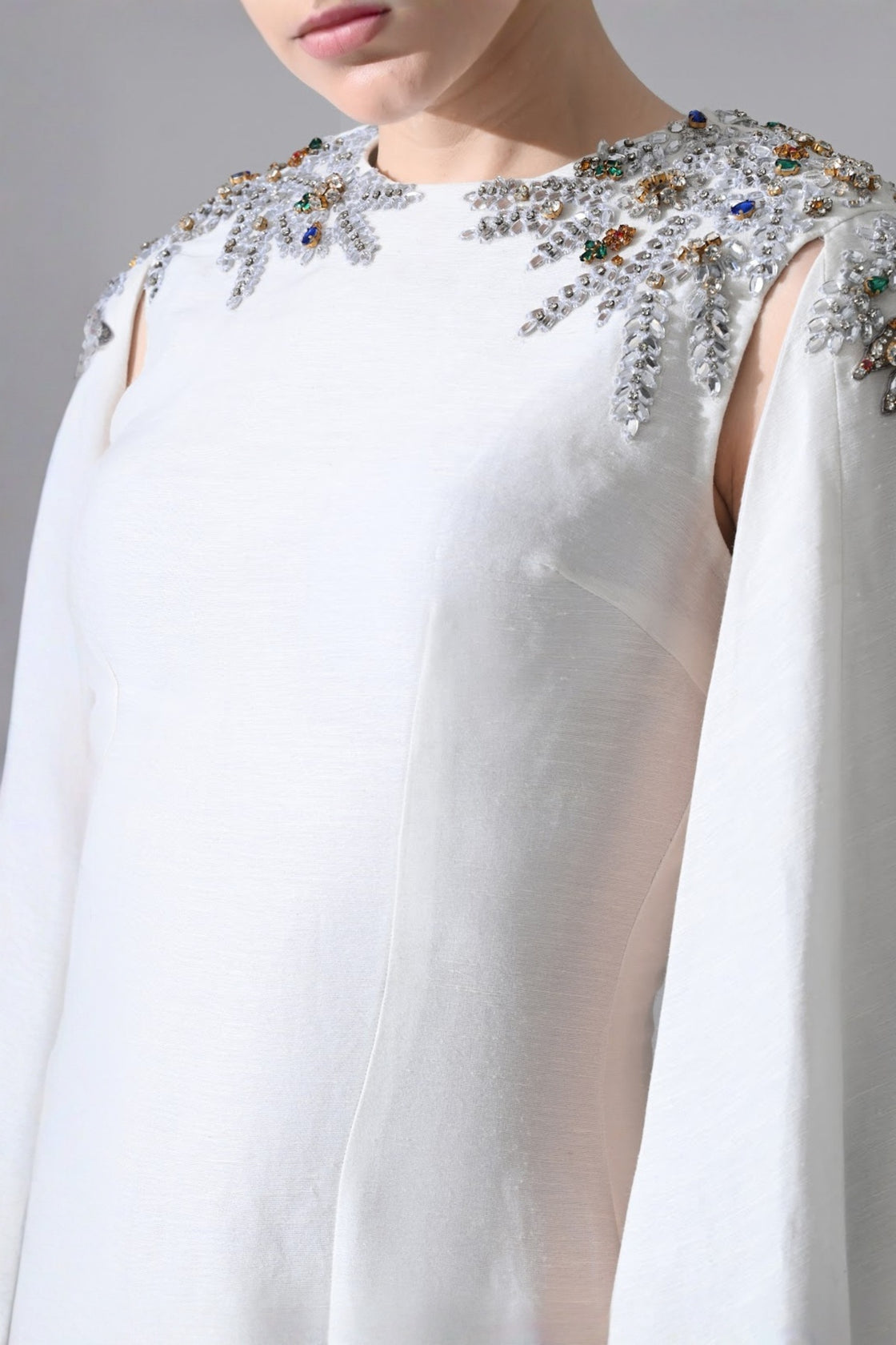 Ivory Gown With Hand-Embellished Shoulders And Draped Cape Sleeves Overlay