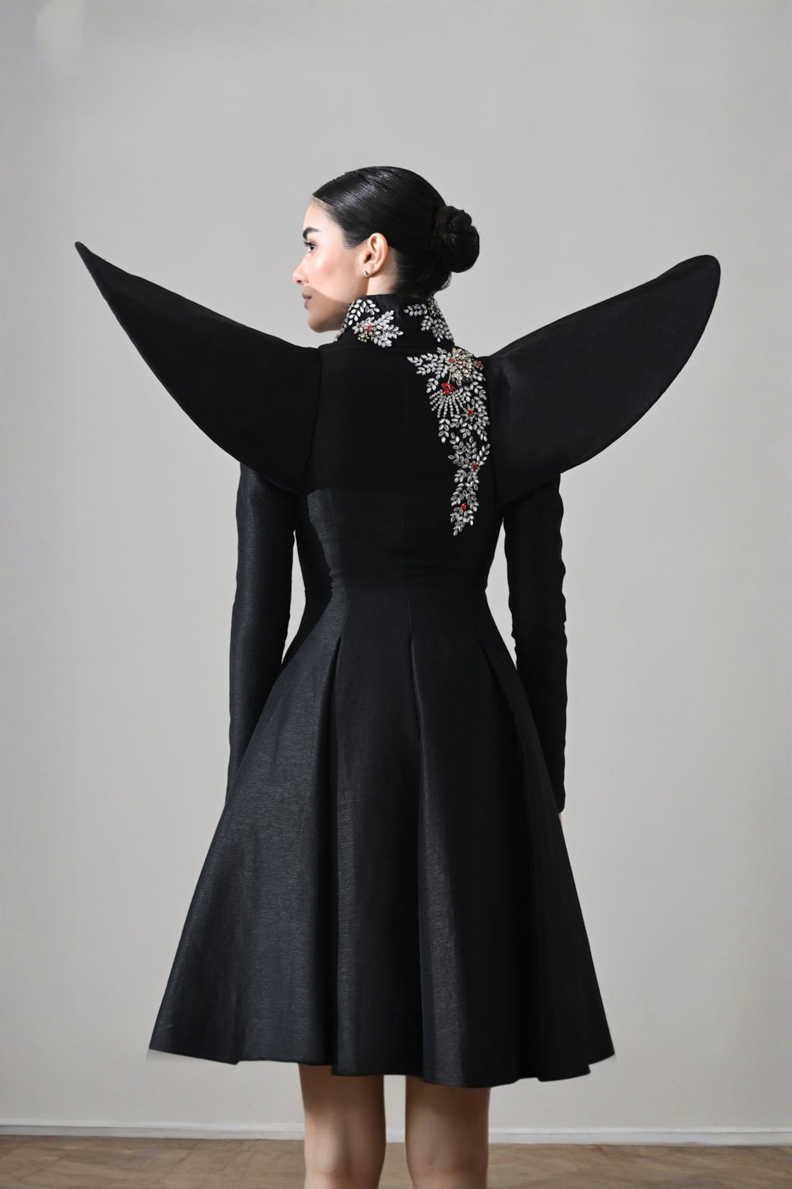 Black Gown With Winged Shoulders And Cascading Hand Embroidery