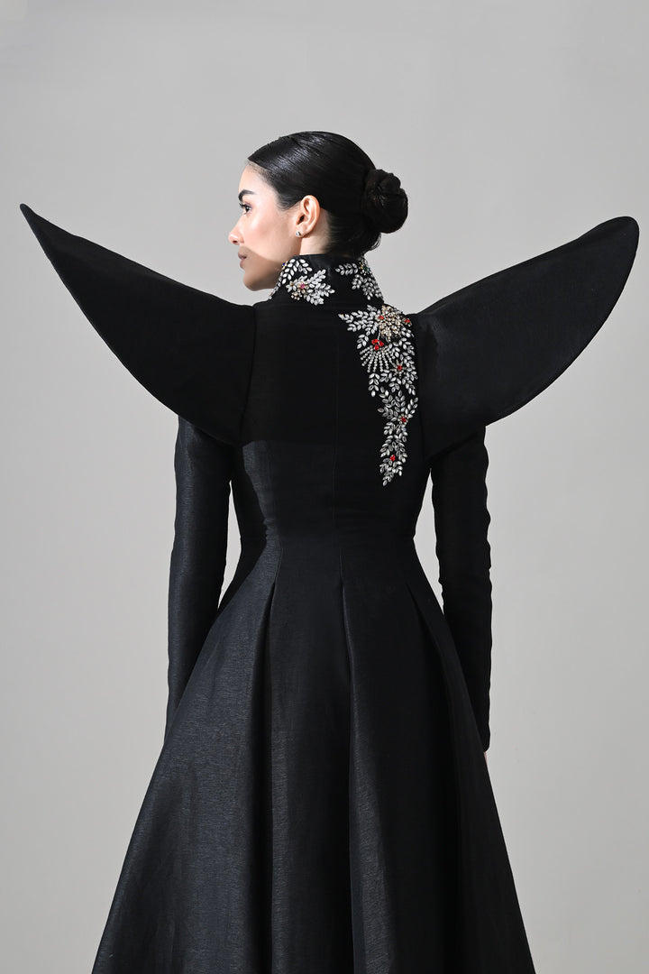 Black Gown With Winged Shoulders And Cascading Hand Embroidery