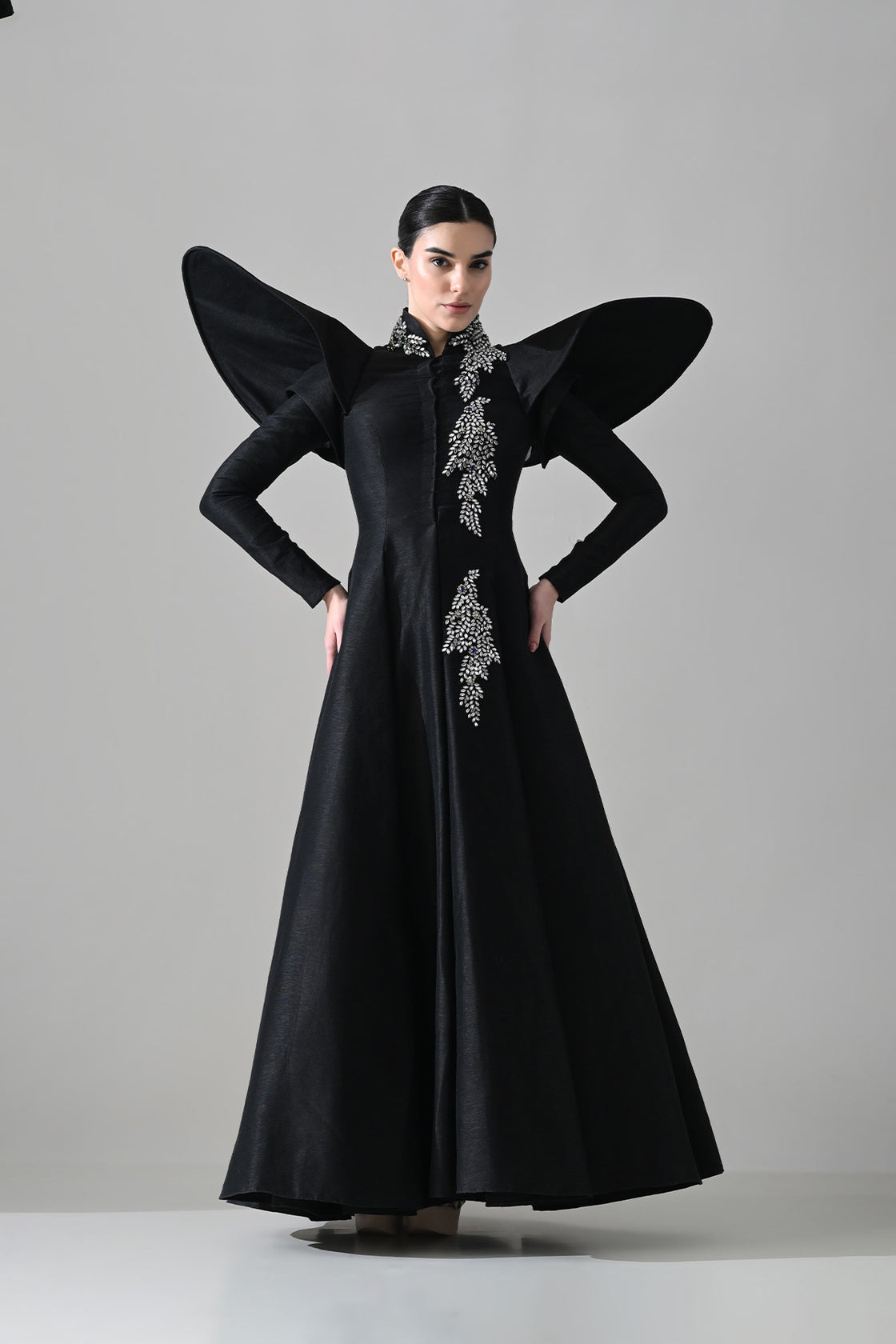 Black Gown With Winged Shoulders And Cascading Hand Embroidery