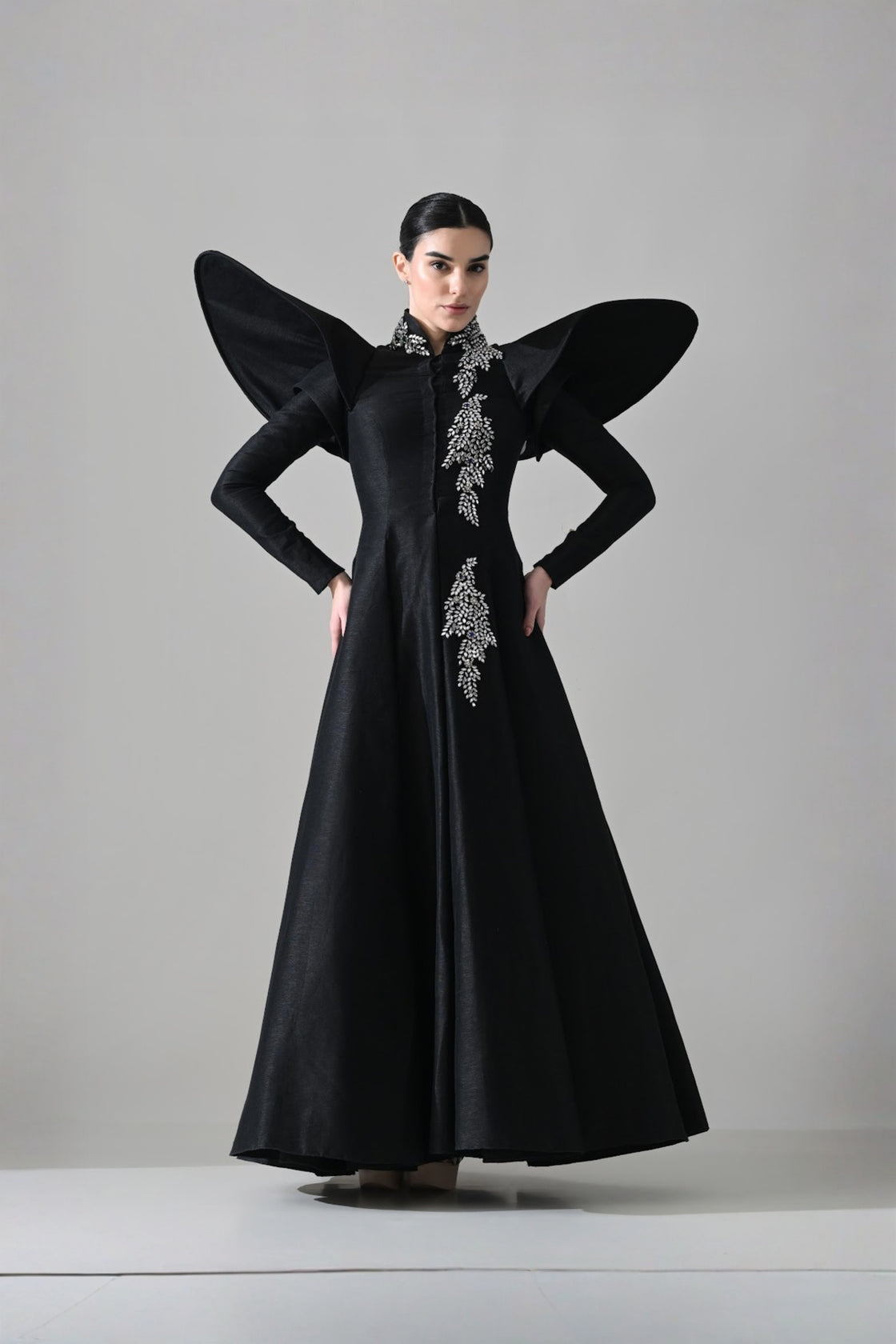 Black Gown With Winged Shoulders And Cascading Hand Embroidery