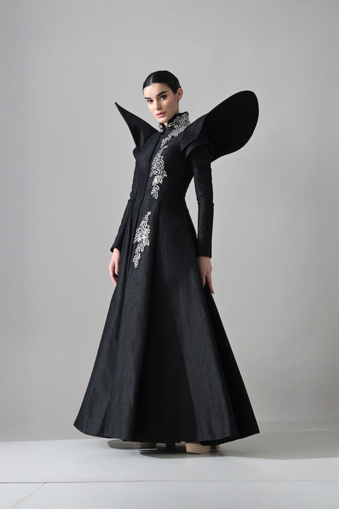 Black Gown With Winged Shoulders And Cascading Hand Embroidery