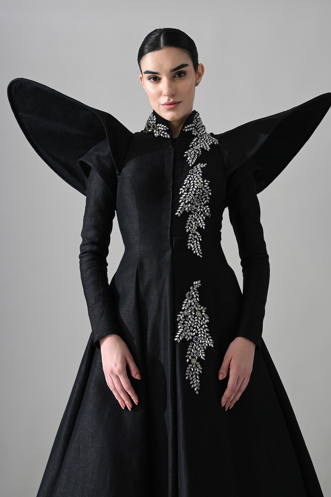 Black Gown With Winged Shoulders And Cascading Hand Embroidery