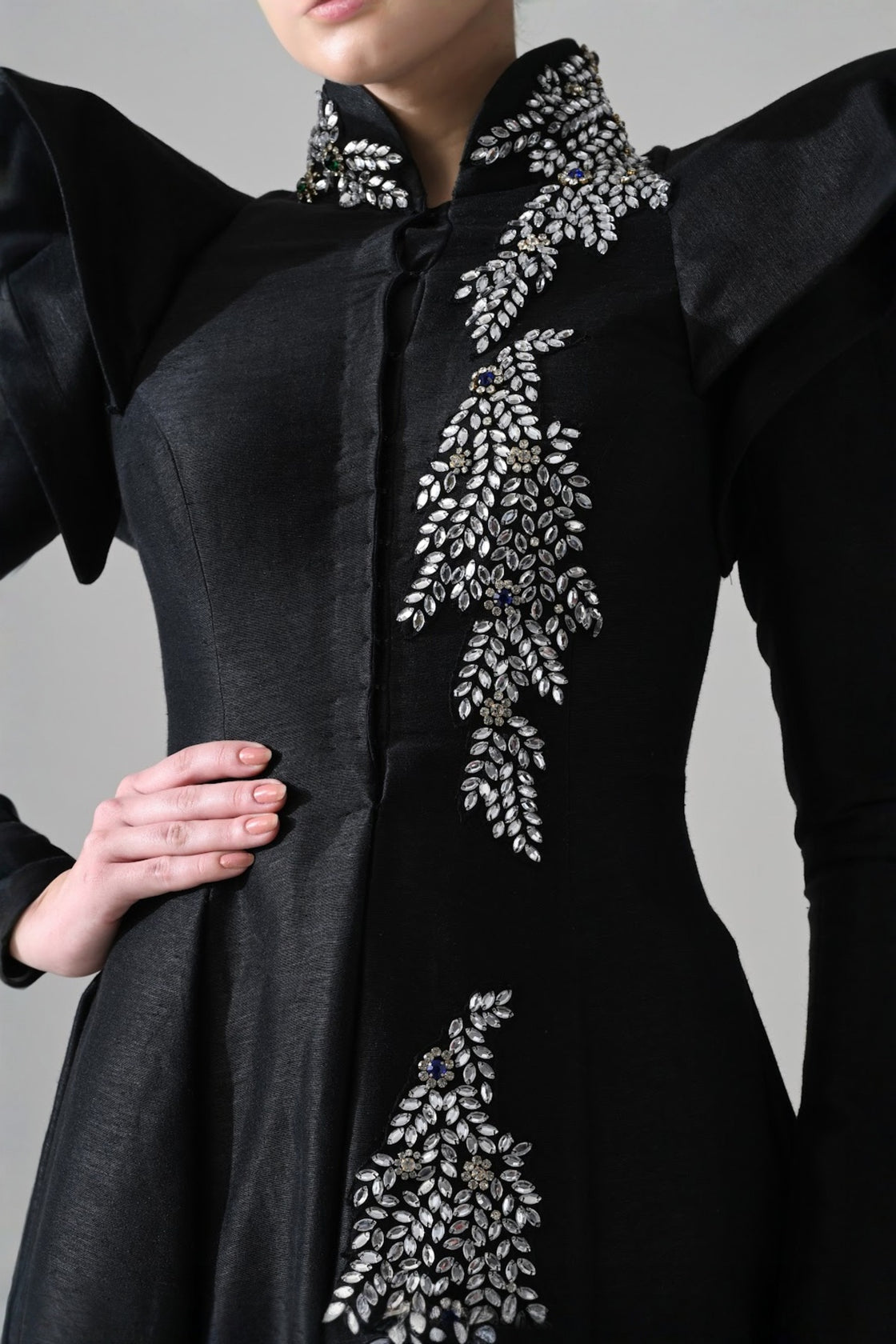 Black Gown With Winged Shoulders And Cascading Hand Embroidery