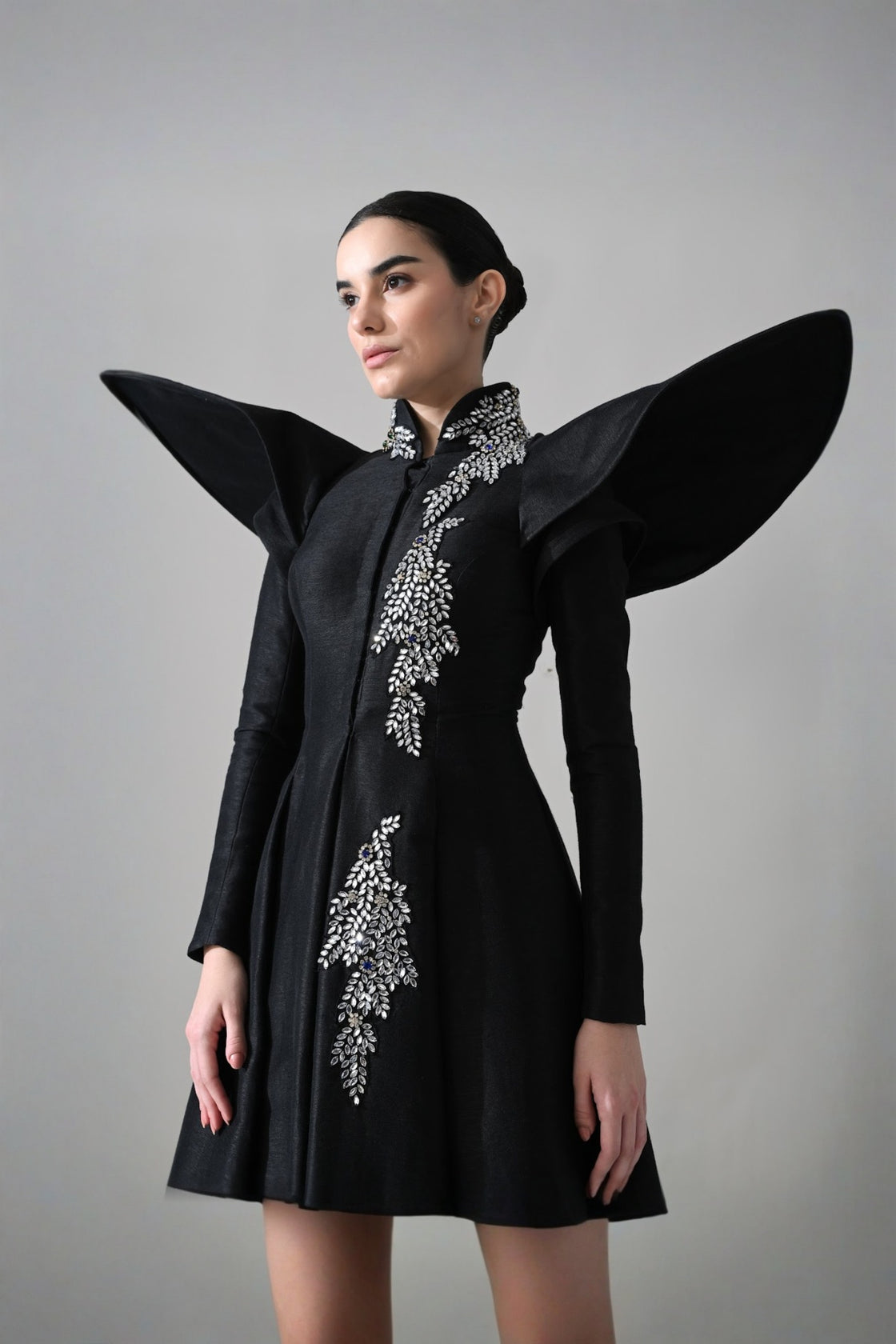 Black Gown With Winged Shoulders And Cascading Hand Embroidery