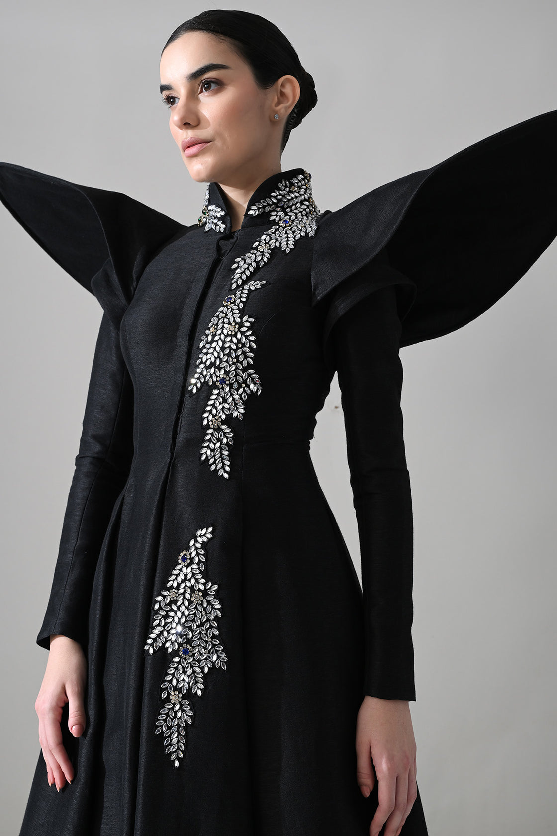 Black Gown With Winged Shoulders And Cascading Hand Embroidery