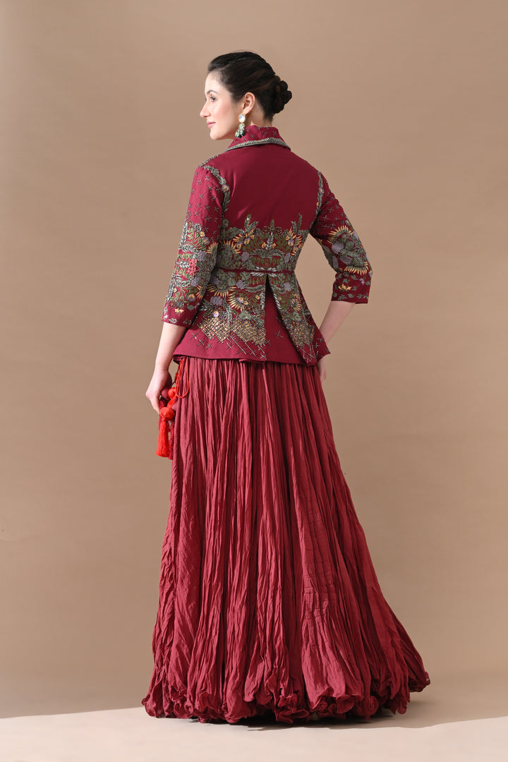 A Maroon Jacket Features Intricate All-Over Embroidery With Skirt