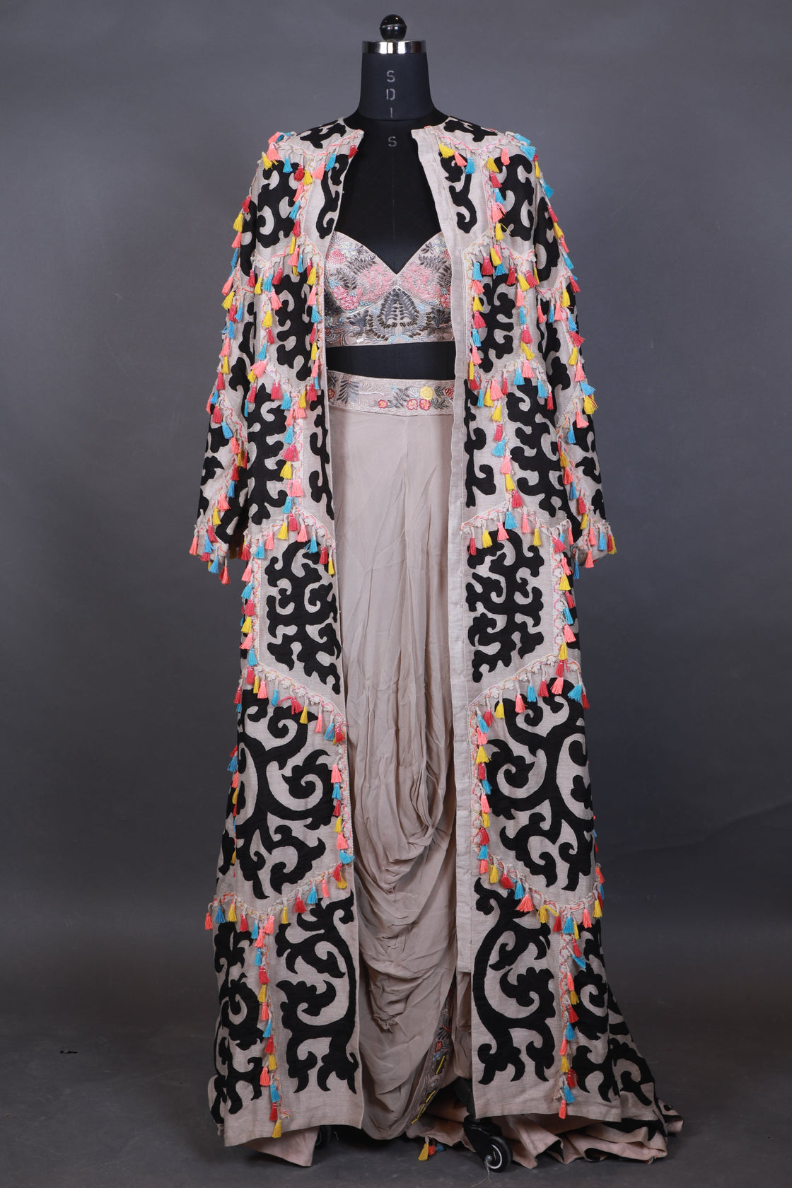 Decorative belt with intricate patterns on a gray background