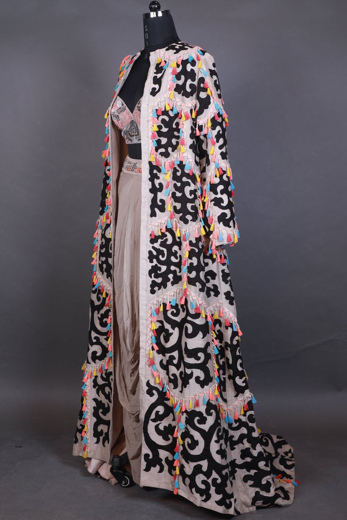 Decorative belt with intricate patterns on a gray background