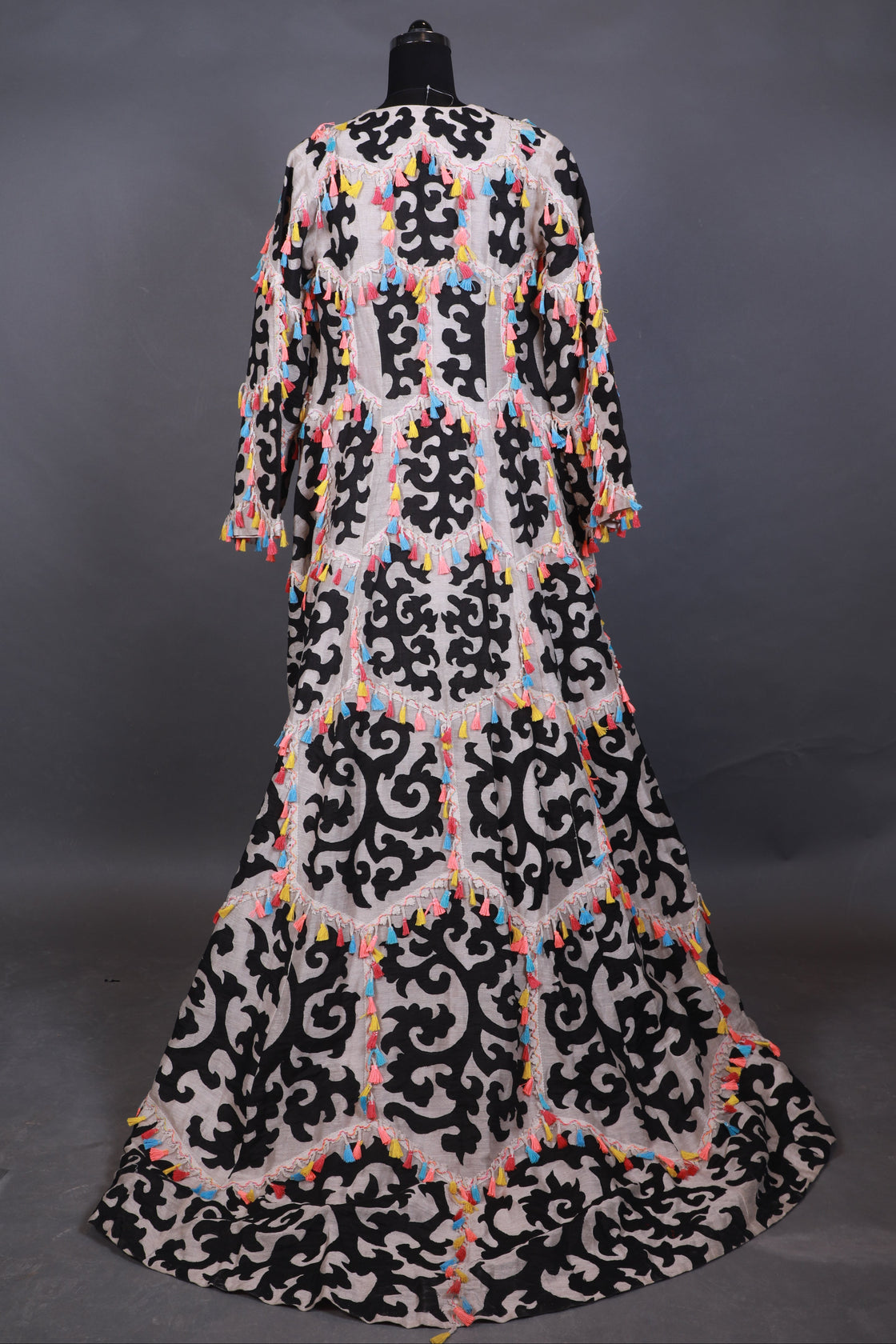 Decorative dress with black and white pattern on a dark background