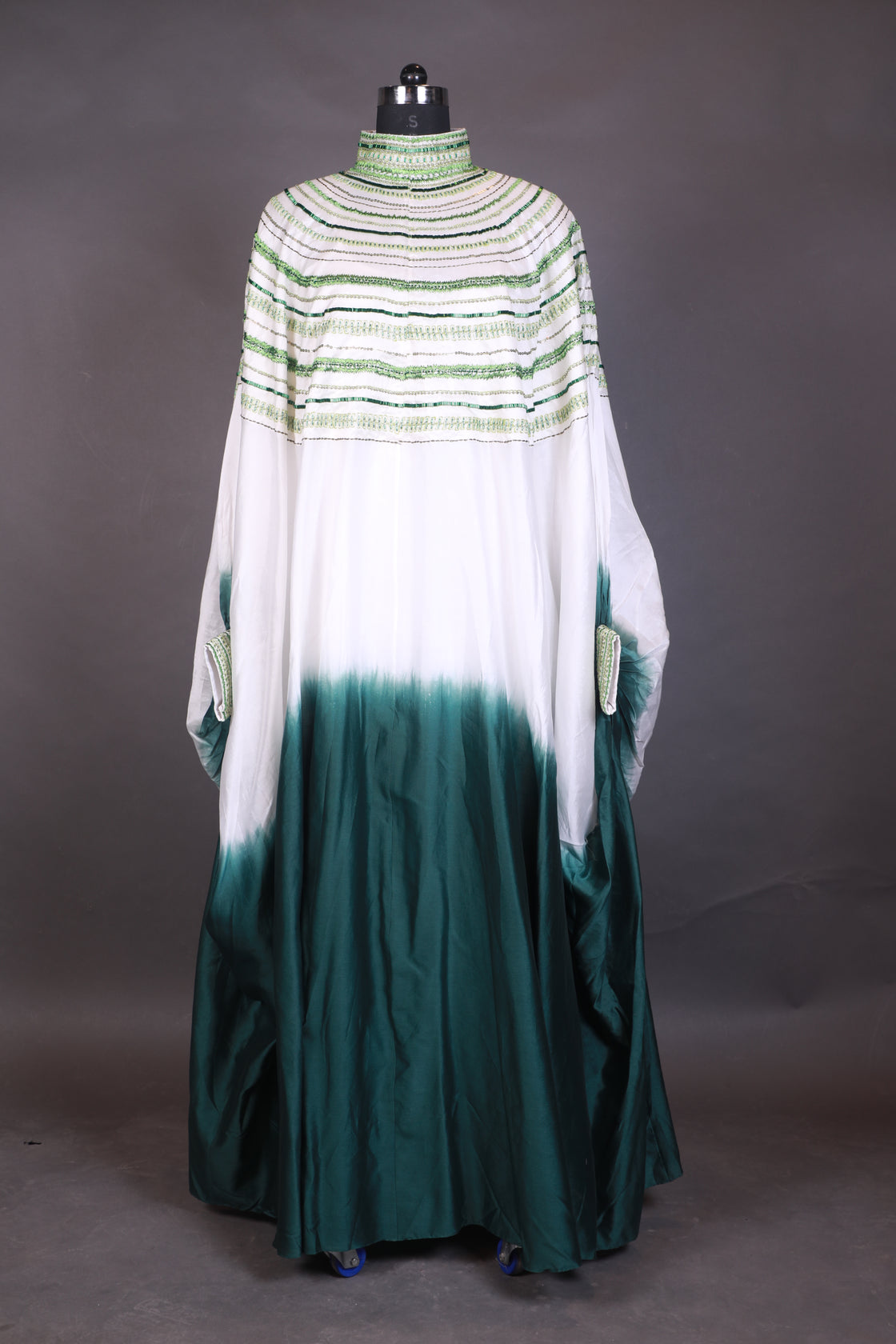 Cotton silk kaftan in Ombre of white and green with a high neckline.
