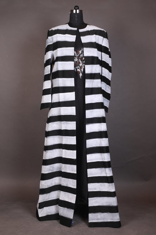 A black cotton silk floor-length jacket with block printed along with embraided neck inner