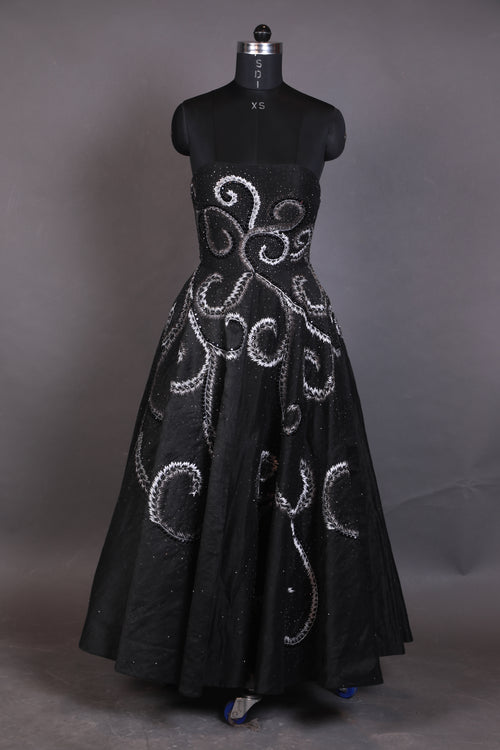 Featured here is a black chanderi A-line dress with a tube top