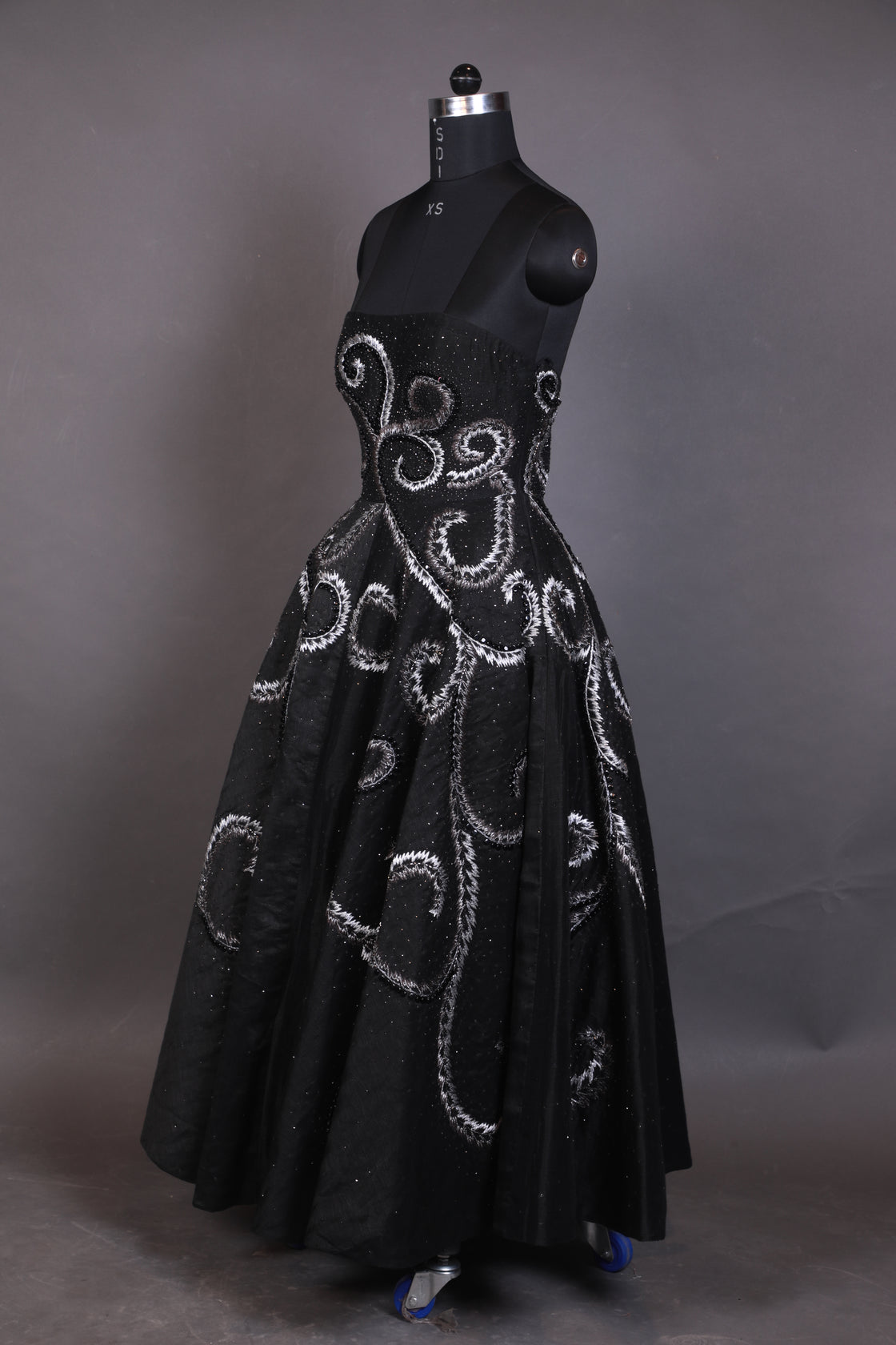 Featured here is a black chanderi A-line dress with a tube top