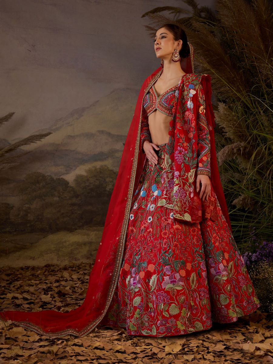 A red organza & cotton silk  lengha with v neck line