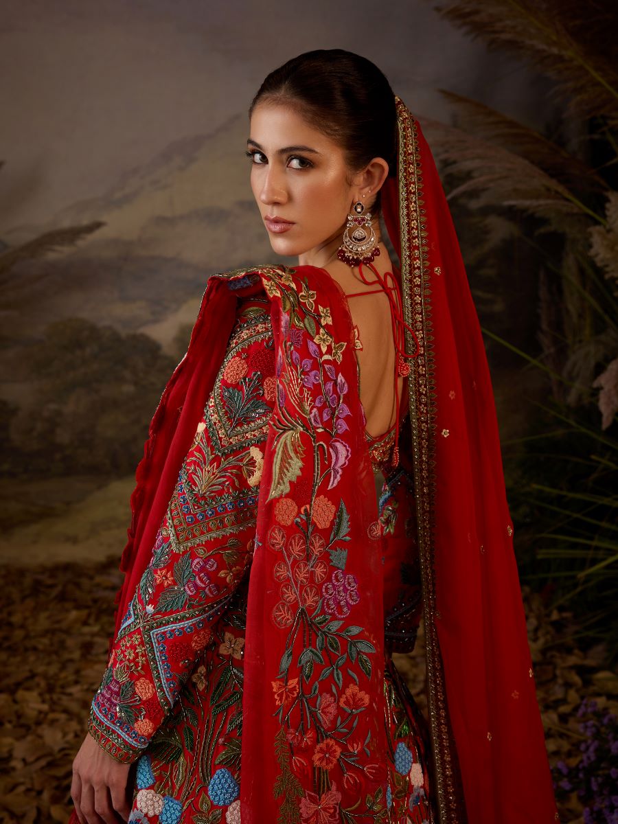 A red organza & cotton silk  lengha with v neck line