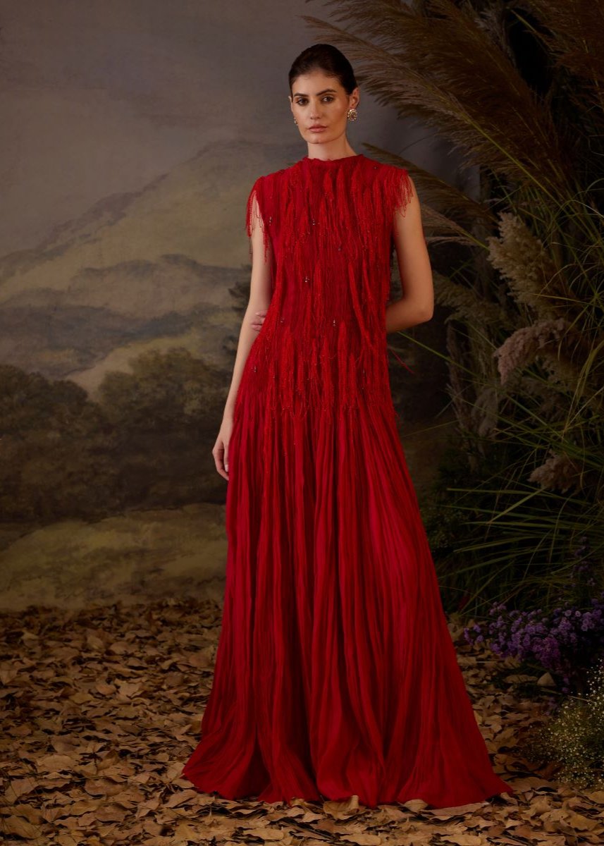 A red cotton silk pleated gown with lace embroidery