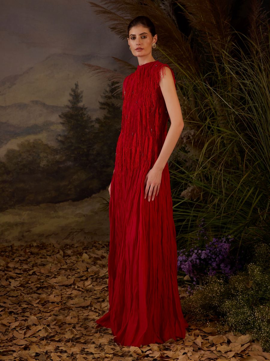 A red cotton silk pleated gown with lace embroidery