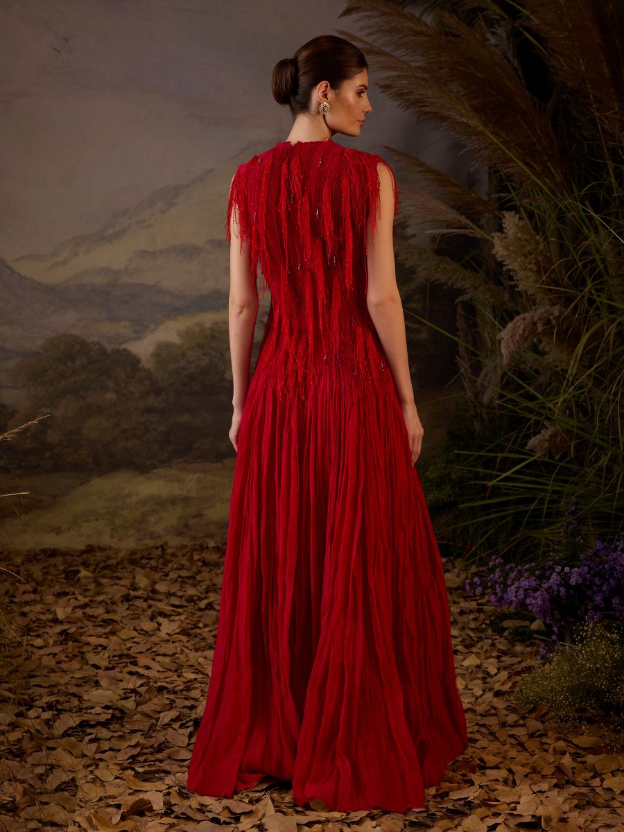 A red cotton silk pleated gown with lace embroidery