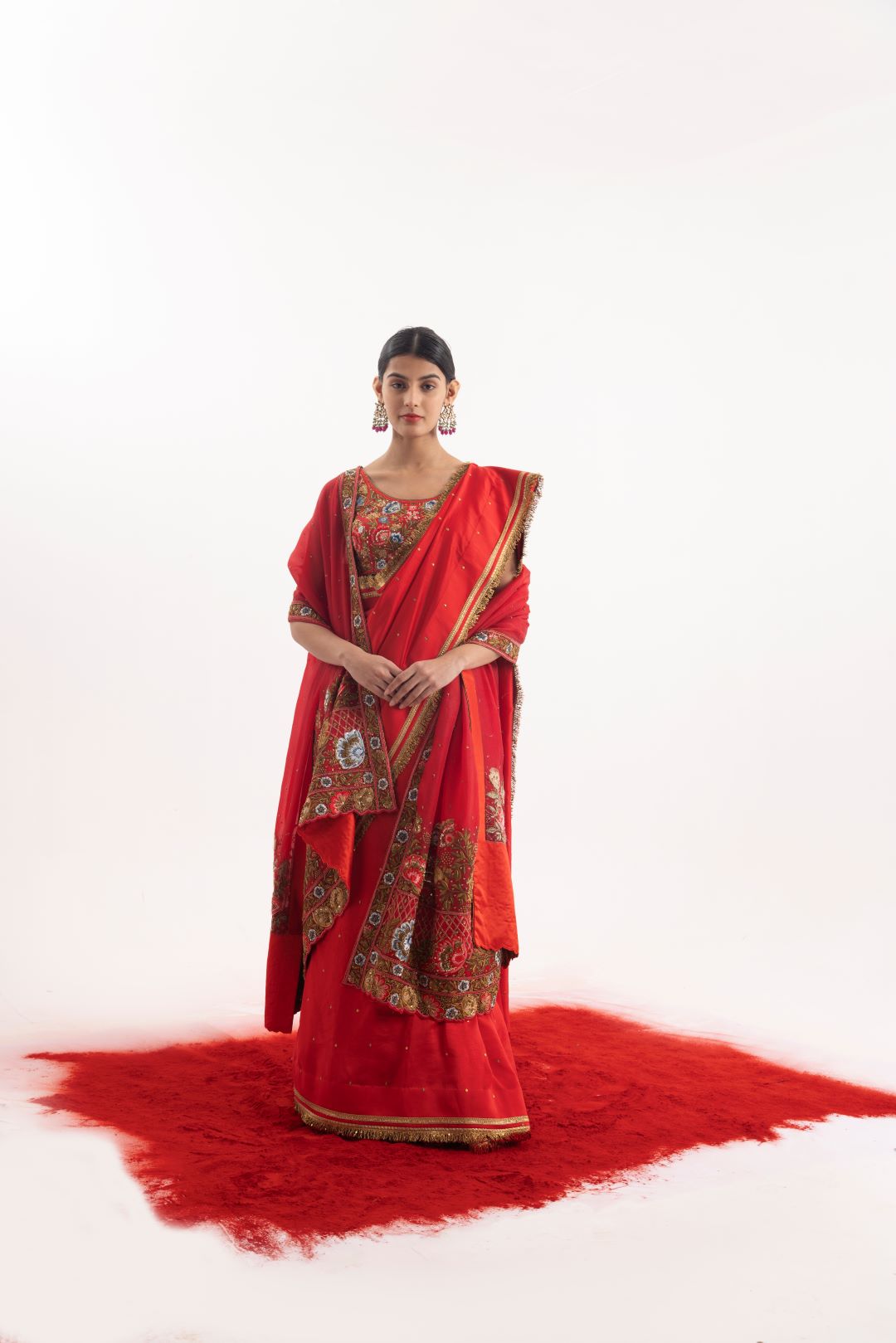 Luxurious 3-piece set showcasing a red embroidered saree