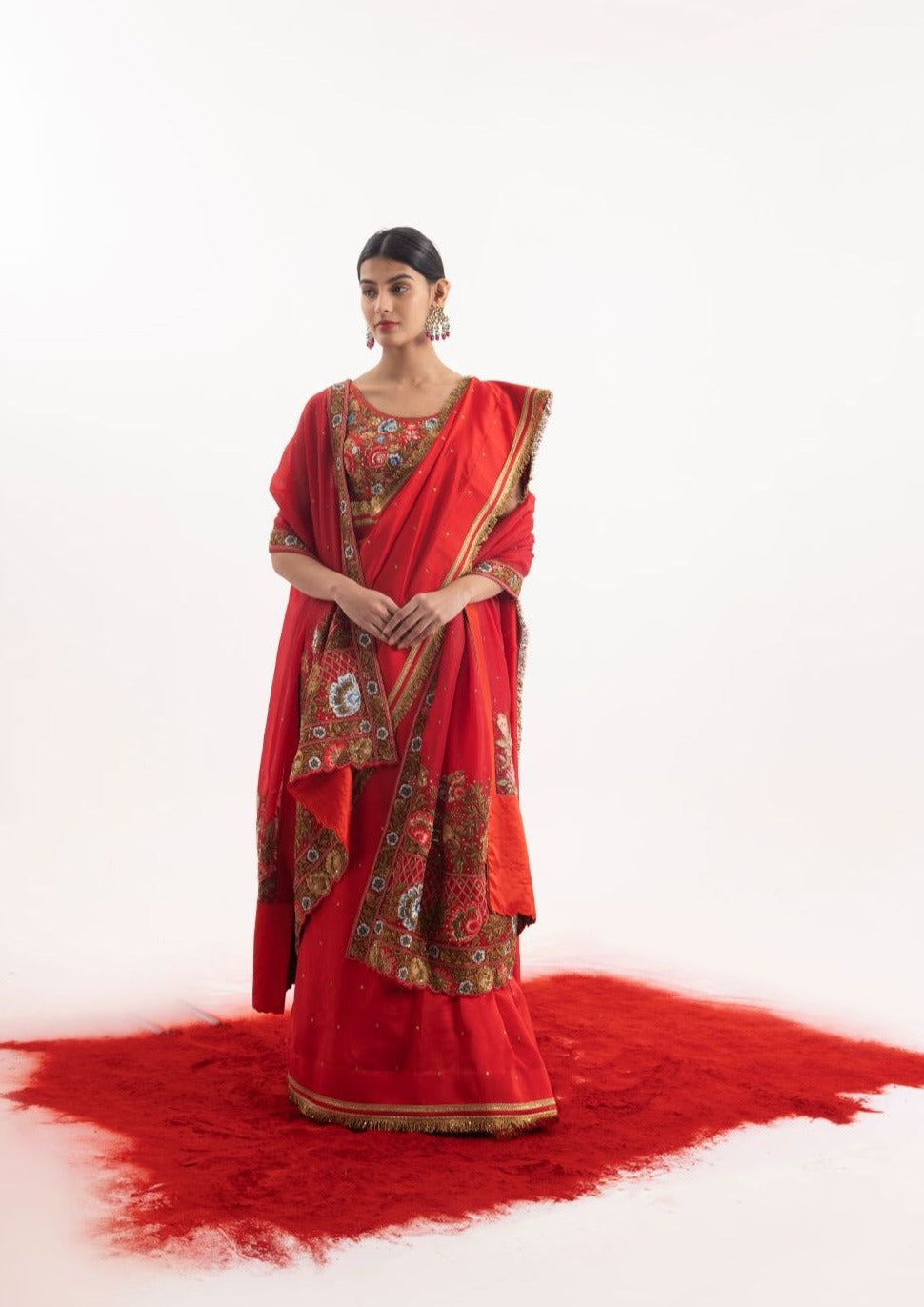 Luxurious 3-piece set showcasing a red embroidered saree