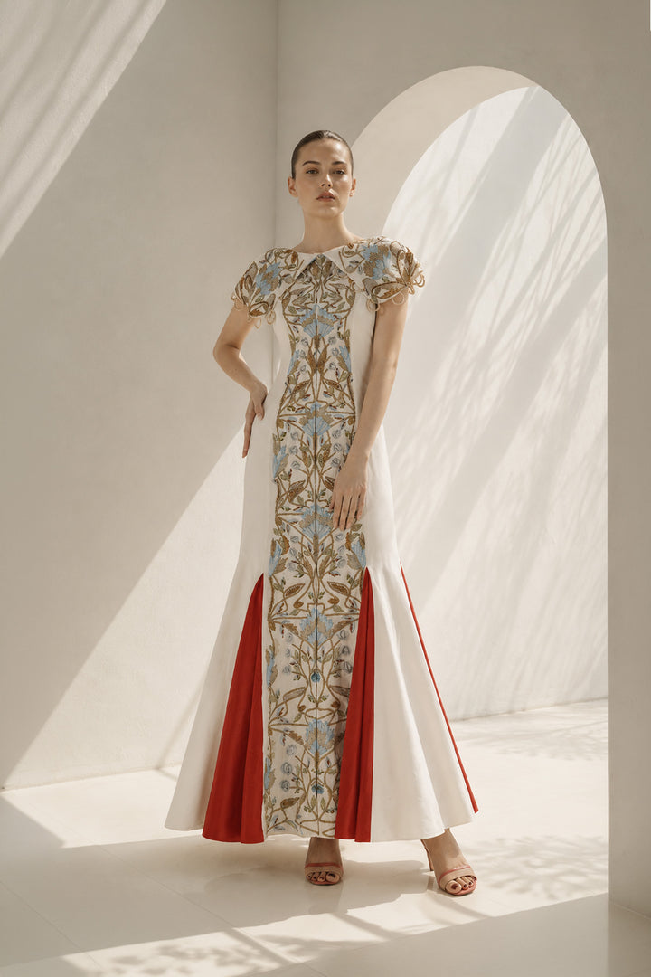 Ivory Gown With Vibrant Red Accents