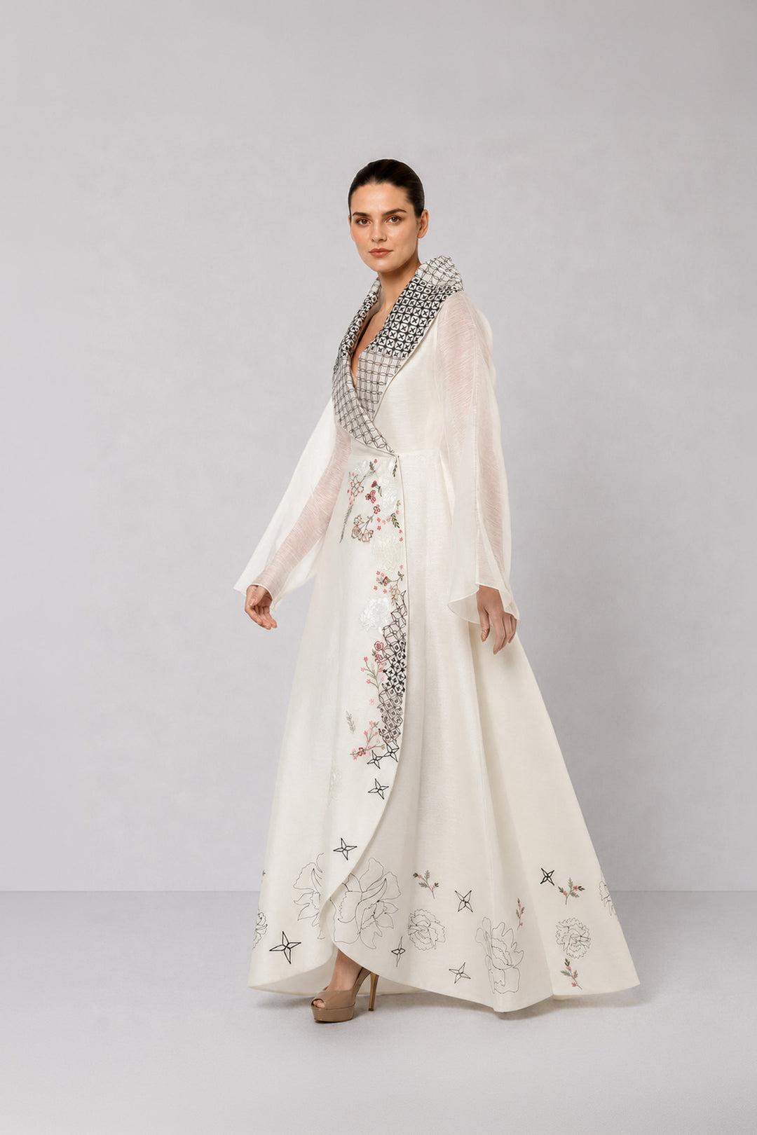 Ivory Wrap Gown With Statement Embroidered Collar And Sheer Bell Sleeves.