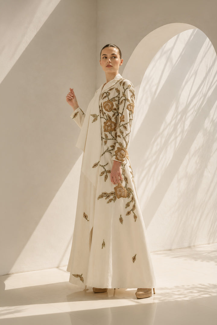 Ivory Gown With Cape-Like Elegance