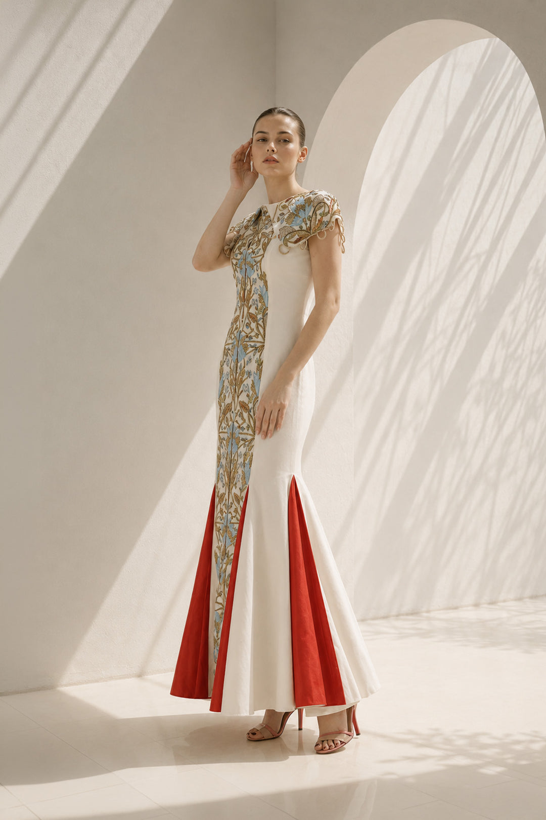 Ivory Gown With Vibrant Red Accents