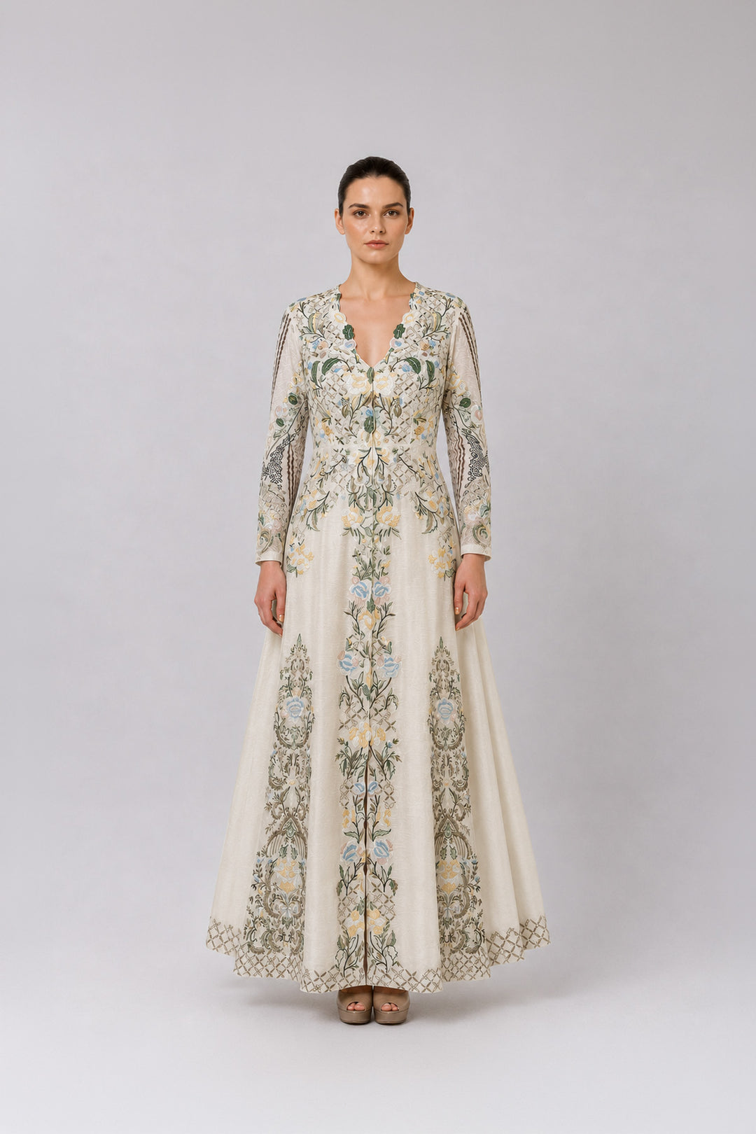 Ivory Embroidered Gown With Pastel Floral Motifs And Elegant V-Neckline.