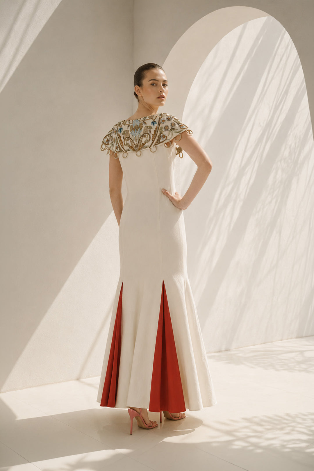 Ivory Gown With Vibrant Red Accents