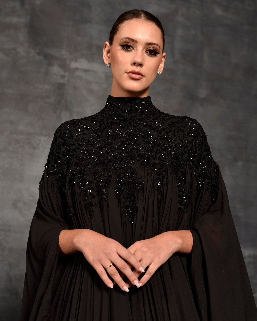 Black kaftan dress with silver zardozi embroidery.