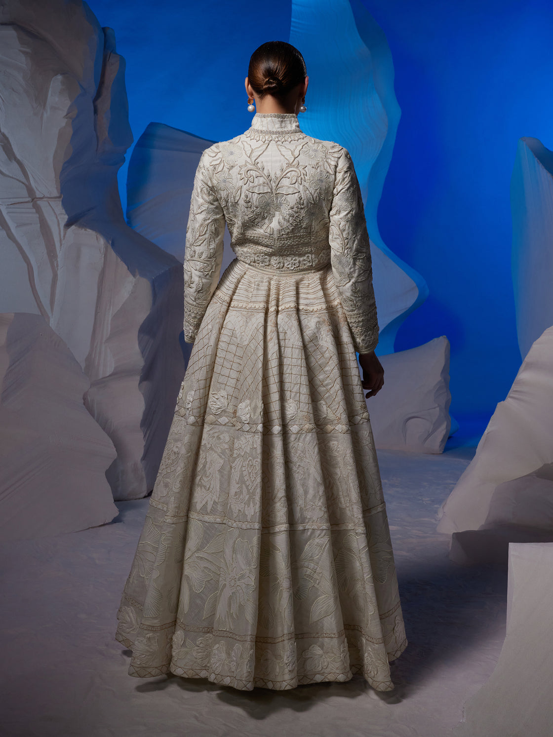 Ivory gown adorned with silk thread embroidery