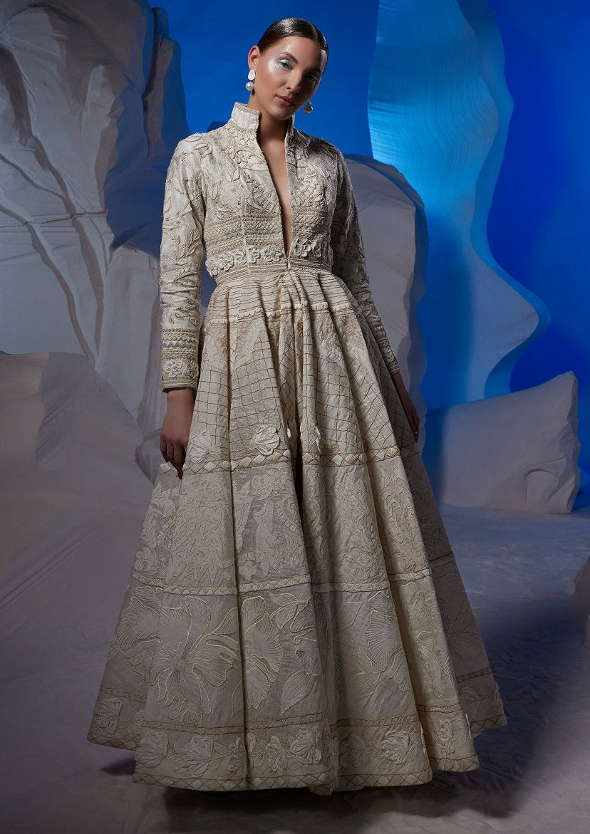 Ivory gown adorned with silk thread embroidery