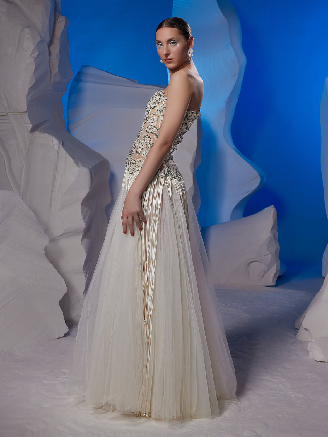 Ivory one-shoulder gown