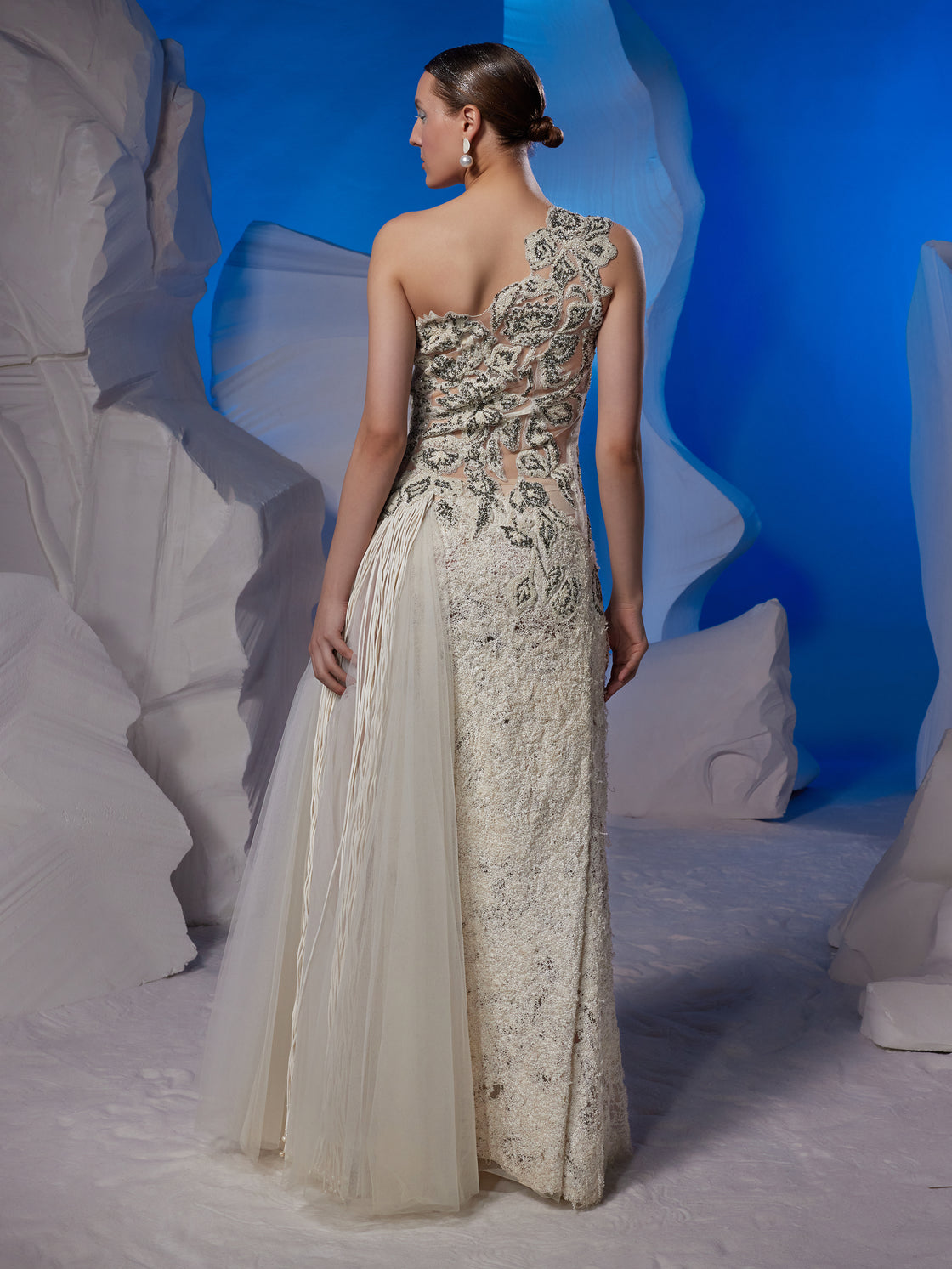 Ivory one-shoulder gown