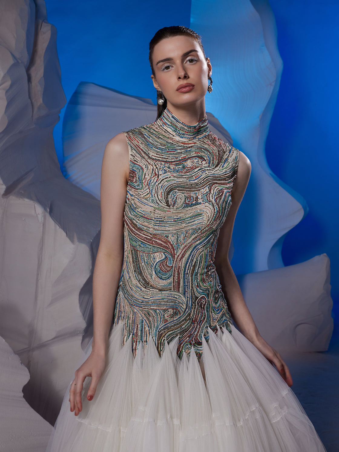 Floor-length gown featuring a high neckline