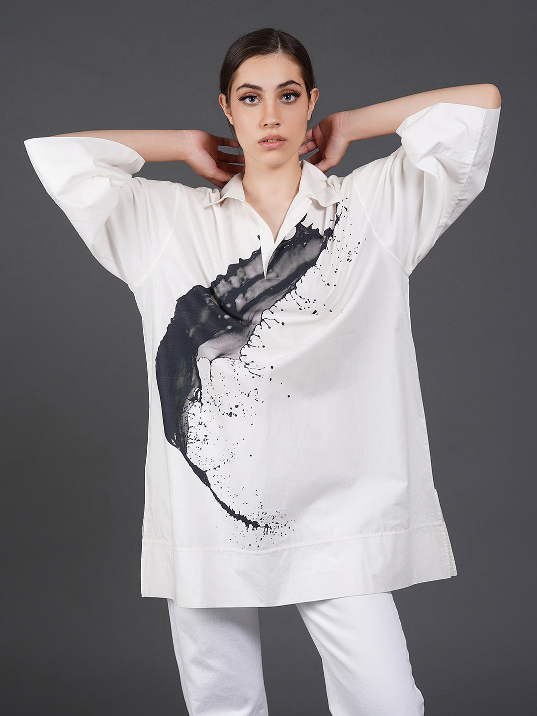 White, stylish, loose-fit, cotton  shirt with digital print on it