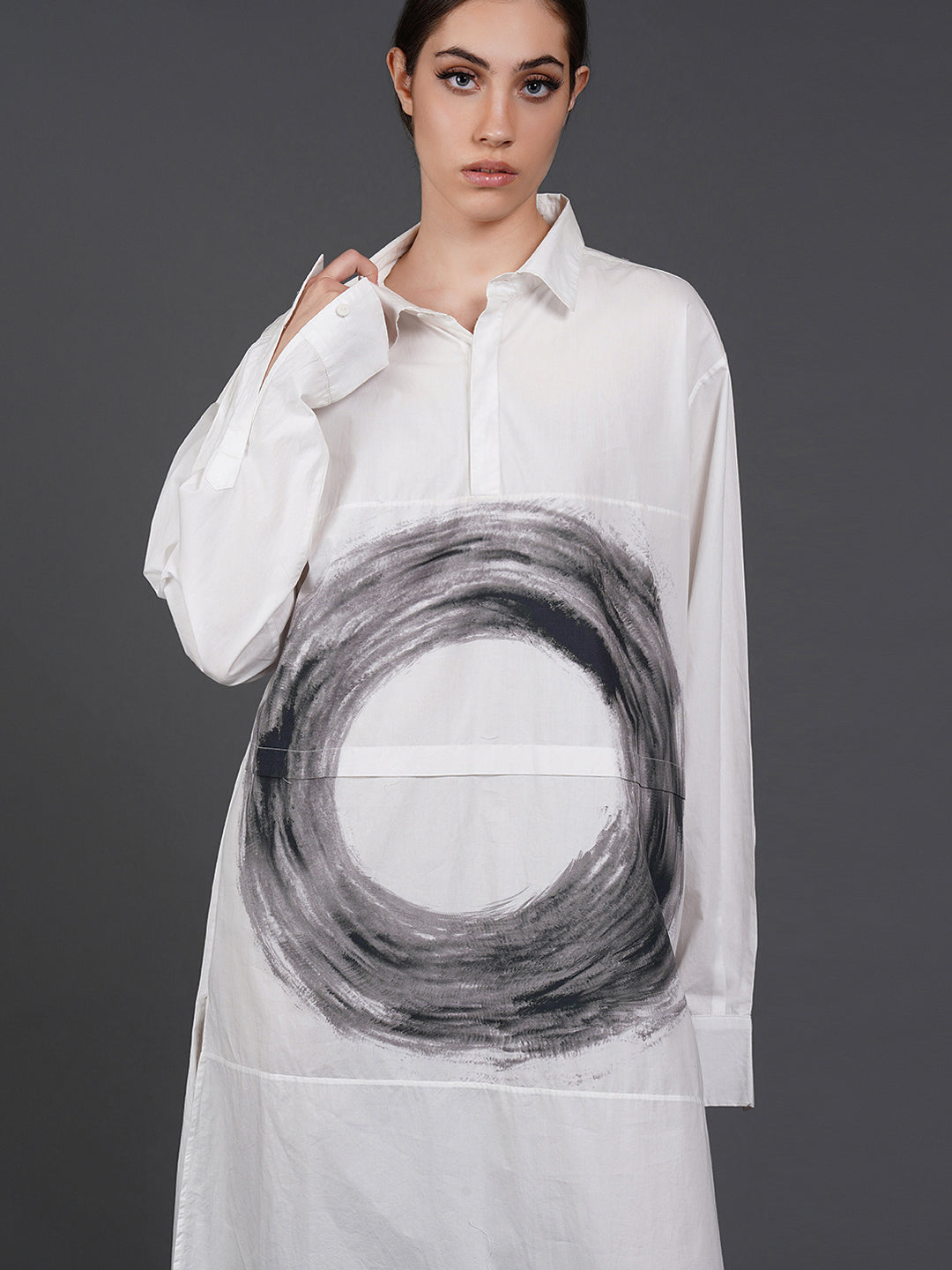 White, stylish, long,lose-fit, cotton shirt with digital print on it